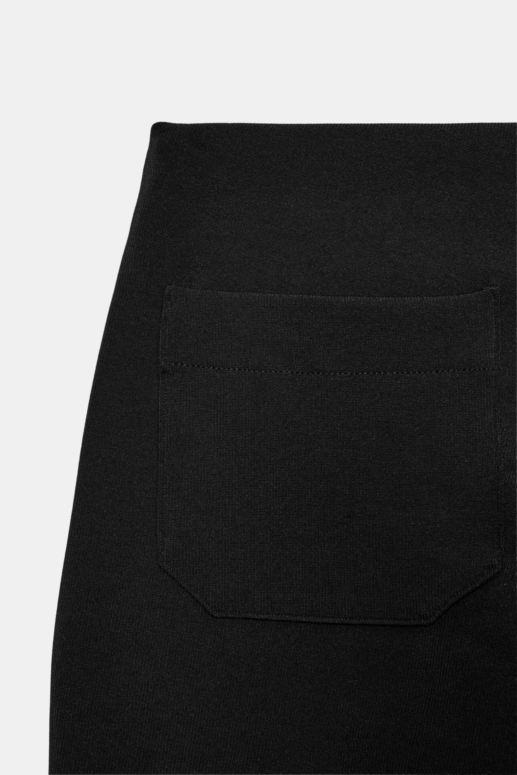 ZARA | Mid-rise trousers with an elasticated waistband. Featuring patch pockets and a fitted leg. — shop this pick from Emily's edit