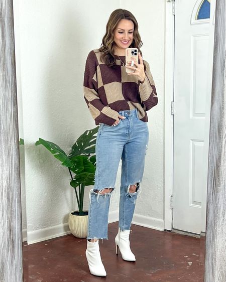 Checkered sweater is back in full stock so hurry because it sold out once already!!! I’m wearing a size small. It’s a crop length but perfect for a front tuck with high waisted jeans! Distressed straight leg jeans are my all time fav (have two pair) and I’m wearing a size 25. Boots are old but linking almost identical!

#LTKSeasonal #LTKHoliday