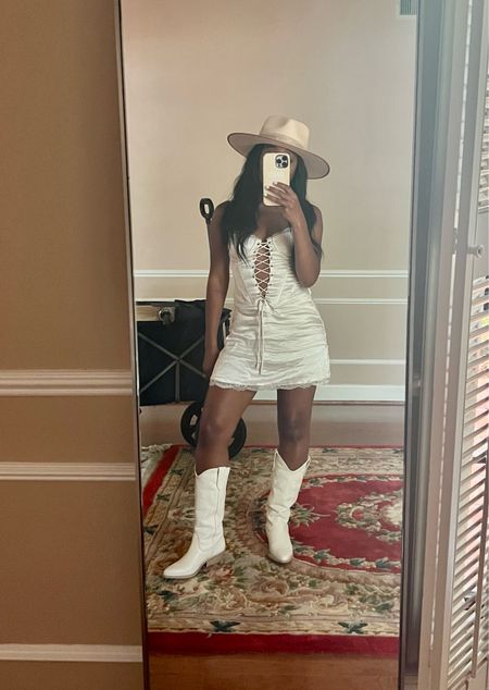 Cream rancher hat, corset mini dress 25%  with code AfterPay, and cowboy boots on sale under $150 

#LTKFestival #LTKshoecrush #LTKFind