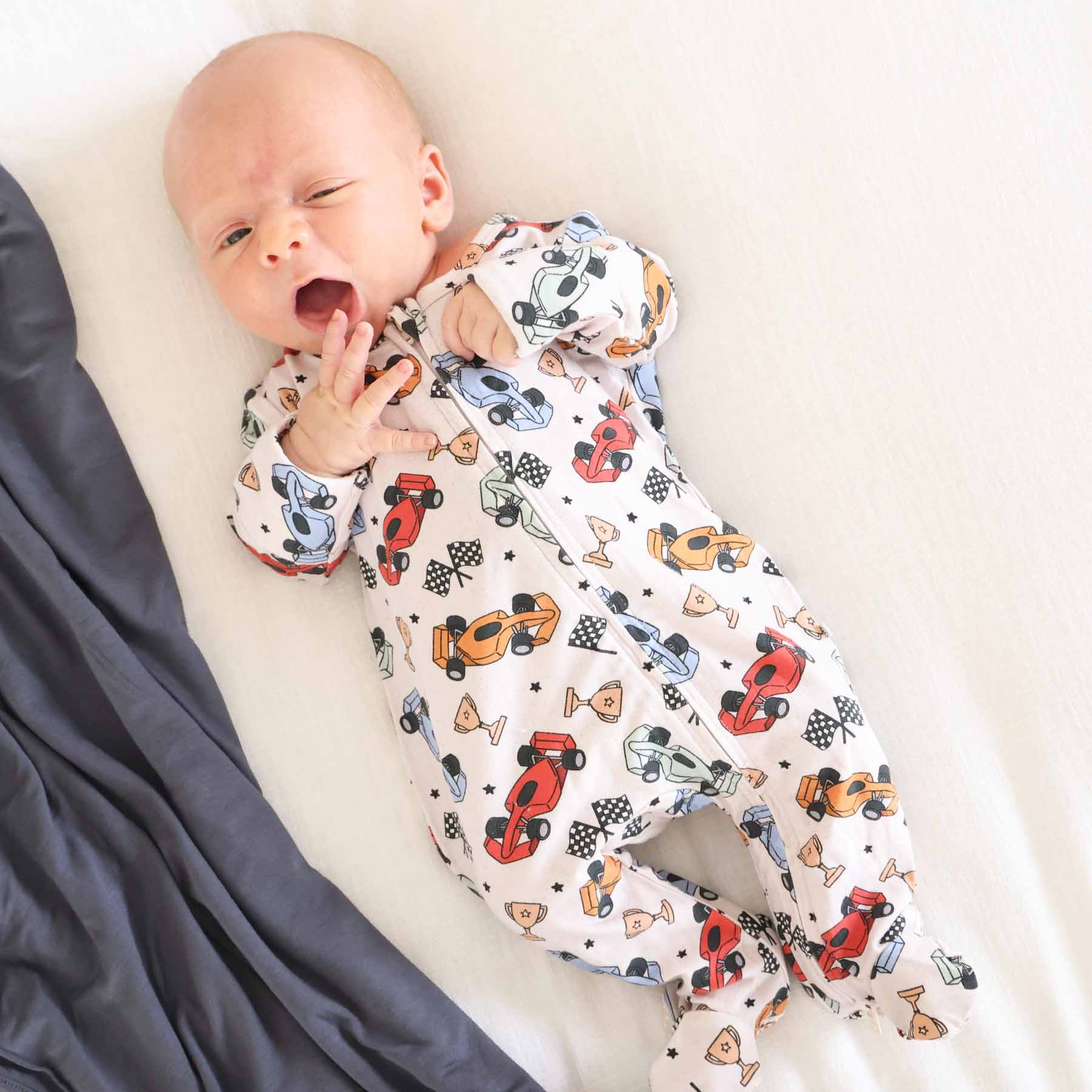 Pit Crew Zipper Footie | Caden Lane