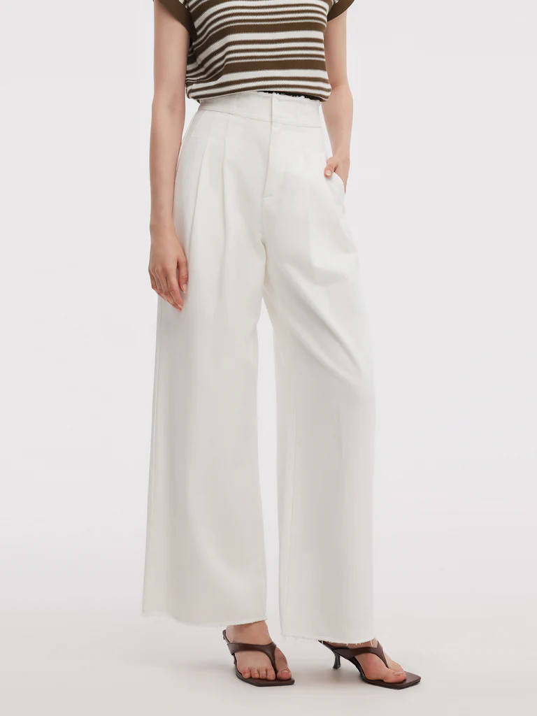 Jeans larges pour femmes à bord effiloché en denim | GOELIA