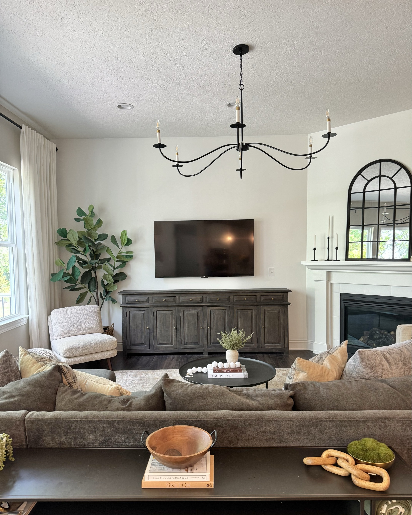 A beautifully updated living room that is both timeless and trendy, and can also withstand kids! Many of these pieces are one of a kind, but I’ve linked similar options wherever it’s needed!

#LTKHome #LTKFamily #LTKStyleTip