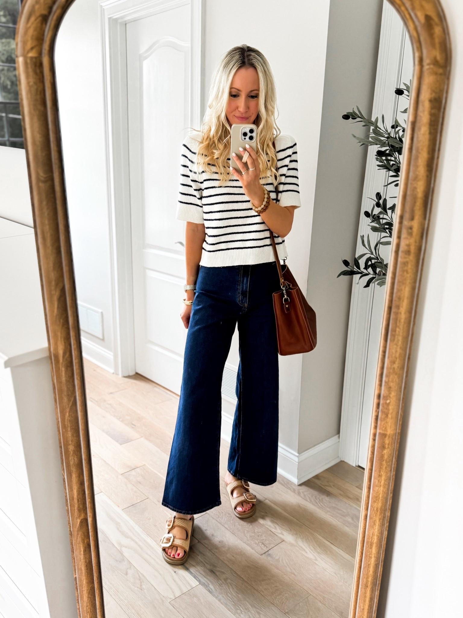 Fall transition outfit idea from Target! Love this pre fall look for teachers and everyday wear! This striped short sleeve sweater is a fave of mine! And these wide leg sailor jeans have been my go-to for a long time! I’m 5’7” wearing xs in the sweater top and sized up one in the wide leg denim. 

#LTKWorkwear #LTKFindsUnder50 #LTKStyleTip