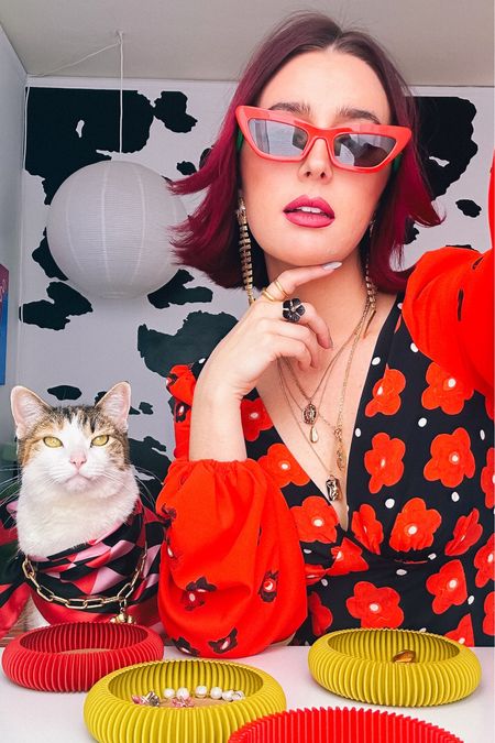 ❤️✨🐱

Champagne wears a black and red puff sleeve dress with gold chain, jewelries and gold snake earrings, red sunglasses. Pony wears a geometric, red, black and pink scarf, bandanna, and a gold chain, seashell necklace and cat sunglasses. 

Dopamine dressing, maximalist, Maximalism, colorful, vibrant outfit 

#LTKparties #LTKbeauty #LTKSeasonal