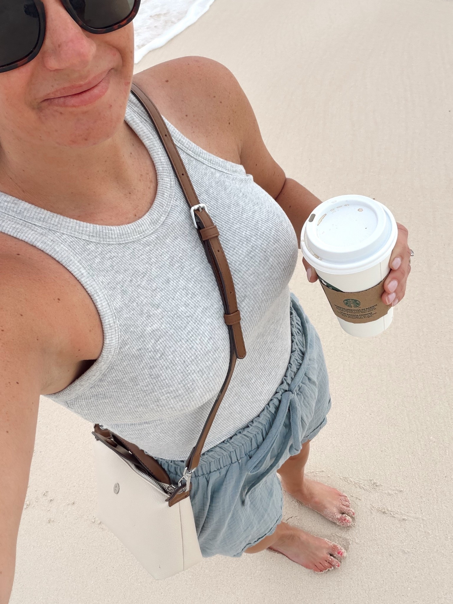 Beach day outfit! Amazon shorts, run true to size, built-in bra tank runs shoe to size and is a must from Amazon! I’m wearing a small and both.￼



#LTKOver40 #LTKootd #LTKTravel