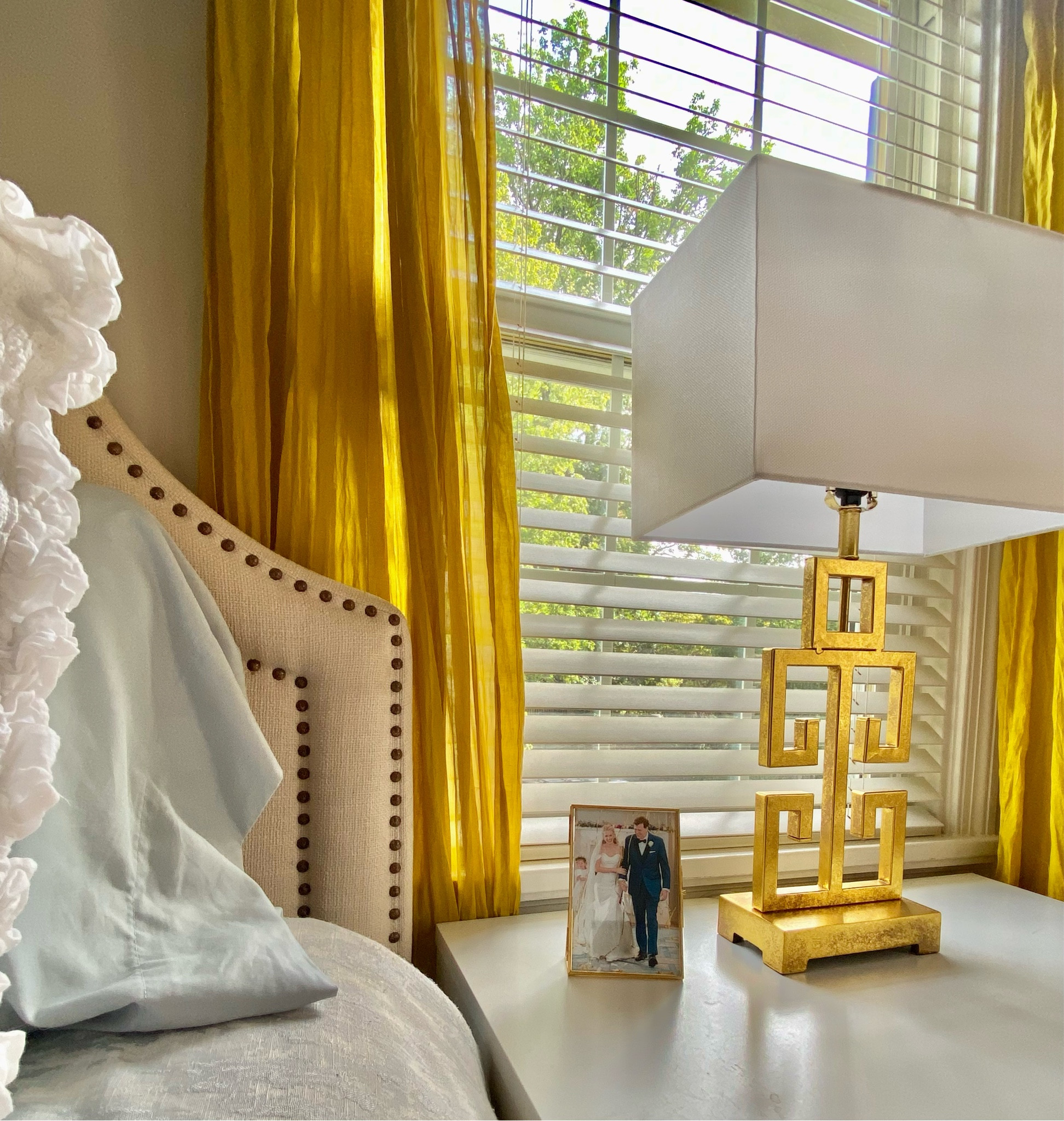 Spring is in the air and it's the perfect time to refresh your bedroom with some bright and cheerful updates! Take a look at this space, featuring a cozy headboard, gauzy chartreuse curtains, and a chic gold leaf Greek key lamp.

The chartreuse curtains add a burst of freshness and energy that instantly brightens up the room. And let's not forget the sleek Greek key lamp that ties it all together. It's the perfect place to recharge and relax after a long day, or to soak up sunshine streaming through the windows on lazy weekend mornings.
.
.
.
#interiordesign #richmondvainteriordesigner #richmondvadesigner #virginiadesigner #interiordesigner #graciouslivingstyle #homedecor #interiorstyle #grandmillennial #homestyle #homeinspiration #houselovers #homedecorinspiration #interiordesignrichmondva #antiques #curateyourspace #traditionalhome #traditionalhomedecor #eleganthome #GreekKey #CozyVibes #curtains #curtainstyle #ikeahack #gilded #safavieh #safaviehhome #goldlamp #beddingdecor #beddingstyle 

#LTKhome #LTKstyletip #LTKFind