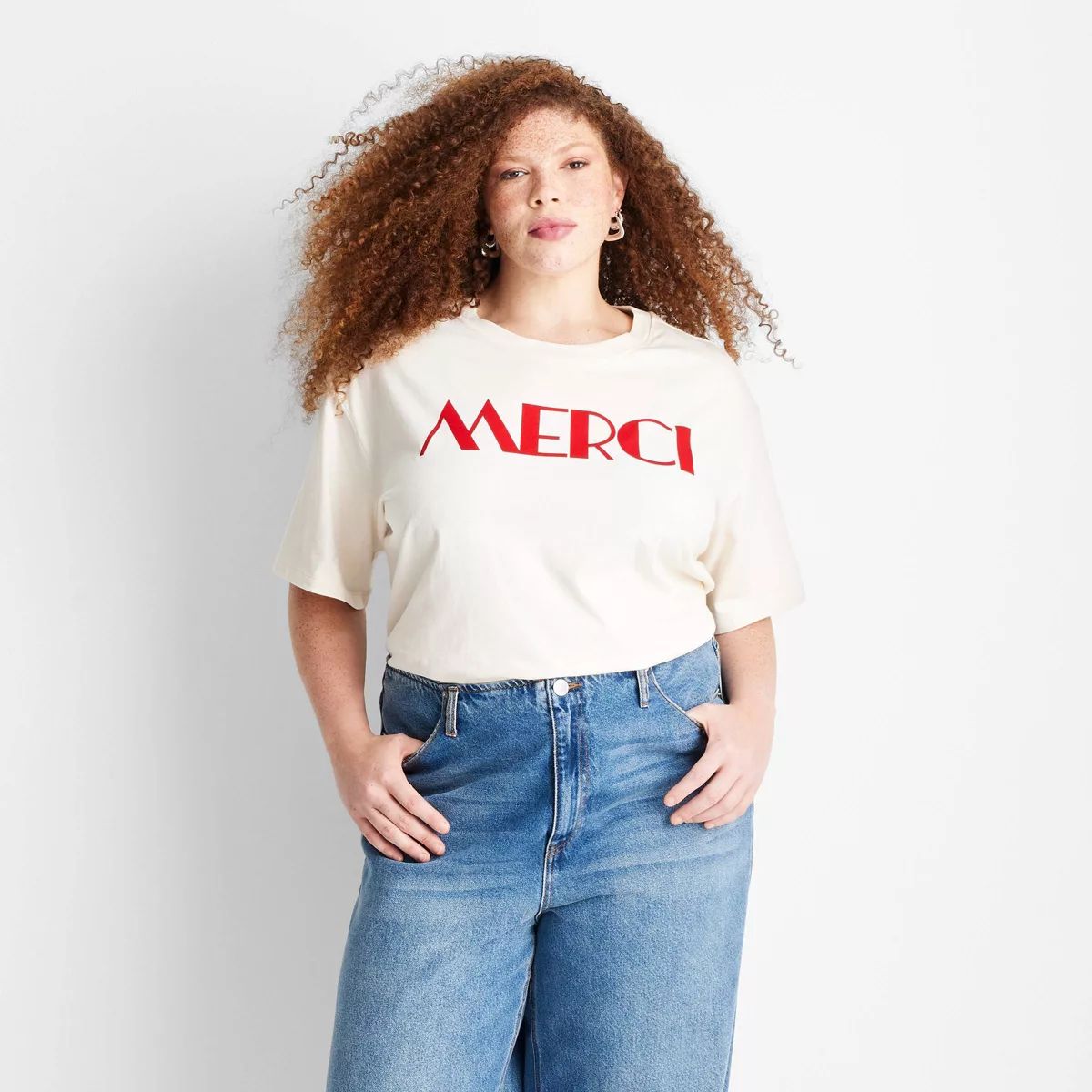 Women's Short Sleeve 'Merci' Graphic T-Shirt - Future Collective Off-White | Target