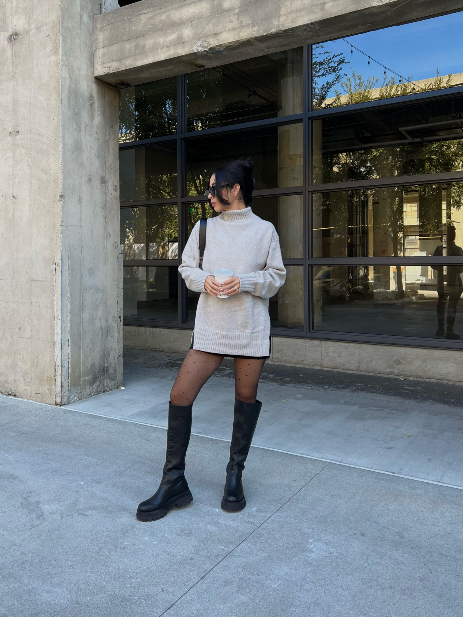 Oversized sweater: size small 
Mini skirt: size 4
Tights: size 1 
Boots: 7:5