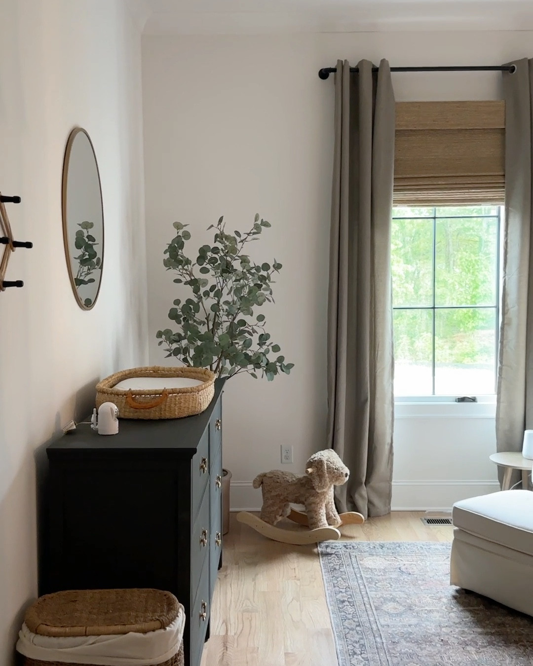 Our sweet gender neutral nursery. Every detail curated with love. From the crib and glider to the black out curtains and rocking horse (dog) :) 

#LTKHome #LTKBaby #LTKVideo