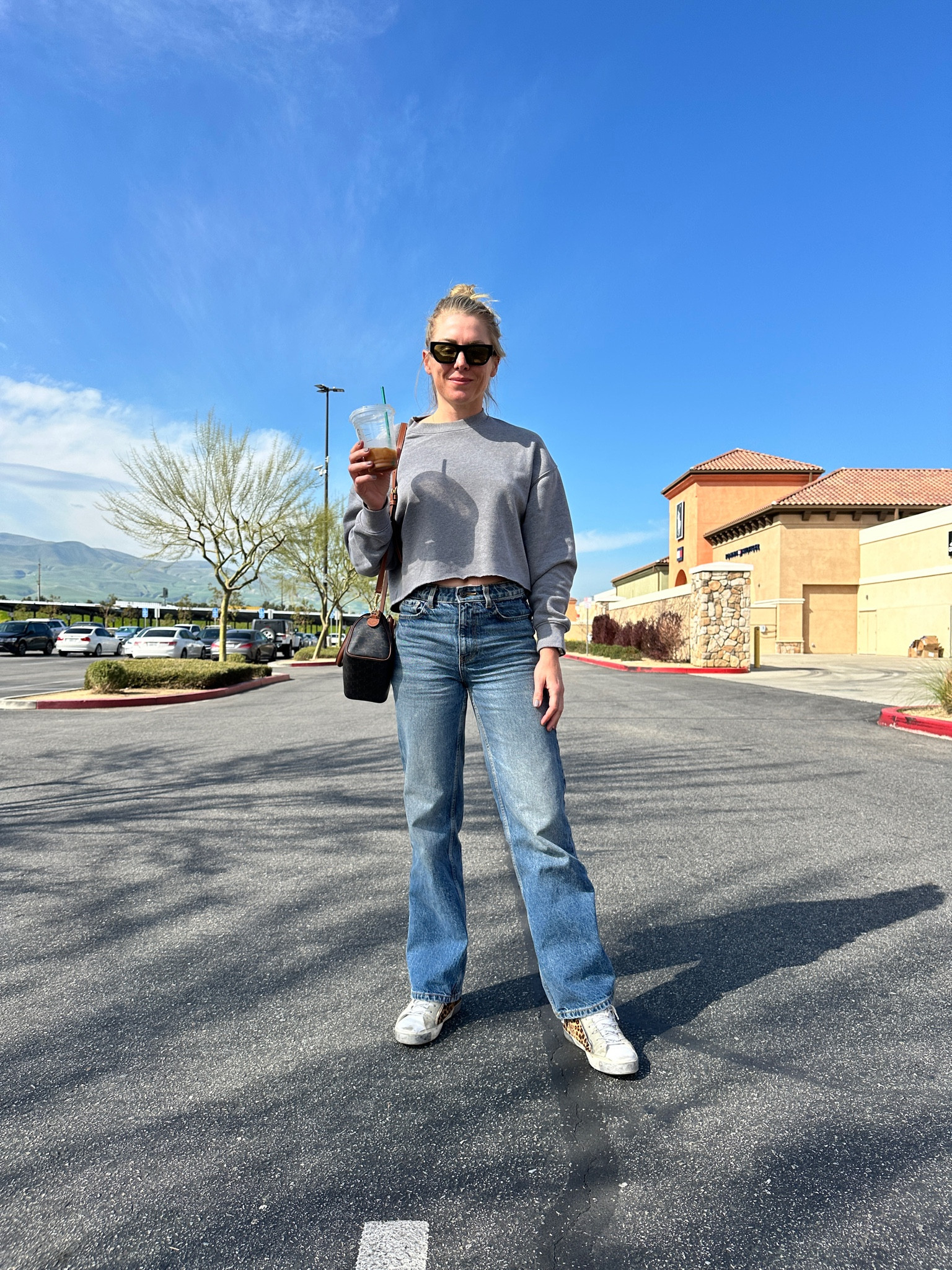 I always hit up the Tejon Outlets when I visit my family in Bakersfield. Nike is always my first stop then H&M. My outfit today is a crop sweater from Target and Zara jeans! Linked sweater and sunnies. Shoes are in a separate post! 