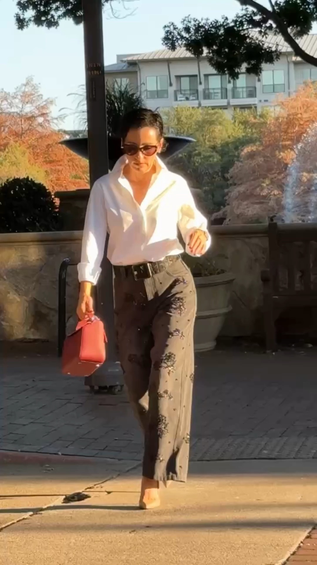 Statement pants are one of my favorite ways to make a classic outfit feel elevated.

These pants are the piece that makes this look memorable. The texture and silhouette add interest, while the crisp white button down keeps everything balanced and timeless.

When you have a statement piece in your outfit, let it lead. Pair it with clean, classic pieces and simple accessories so the look feels sophisticated rather than busy.

statement pants, textured pants, white button down, elevated style, classic wardrobe, styling tips, capsule wardrobe, timeless fashion, elegant outfit ideas, women over 50 style, luxury style, Style with Eugenia
