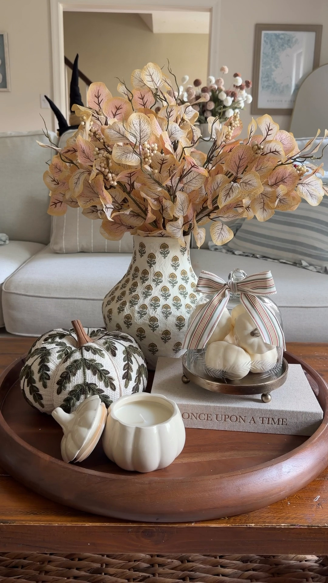 I love @Michaels seasonal ribbon and this one for Fall is perfect! I love a pumpkin pattern but these stripes are so chic and I love the colors. I used it to decorate my new glass cloche and displayed it in a fall centerpiece!

#LTKHome #LTKSeasonal