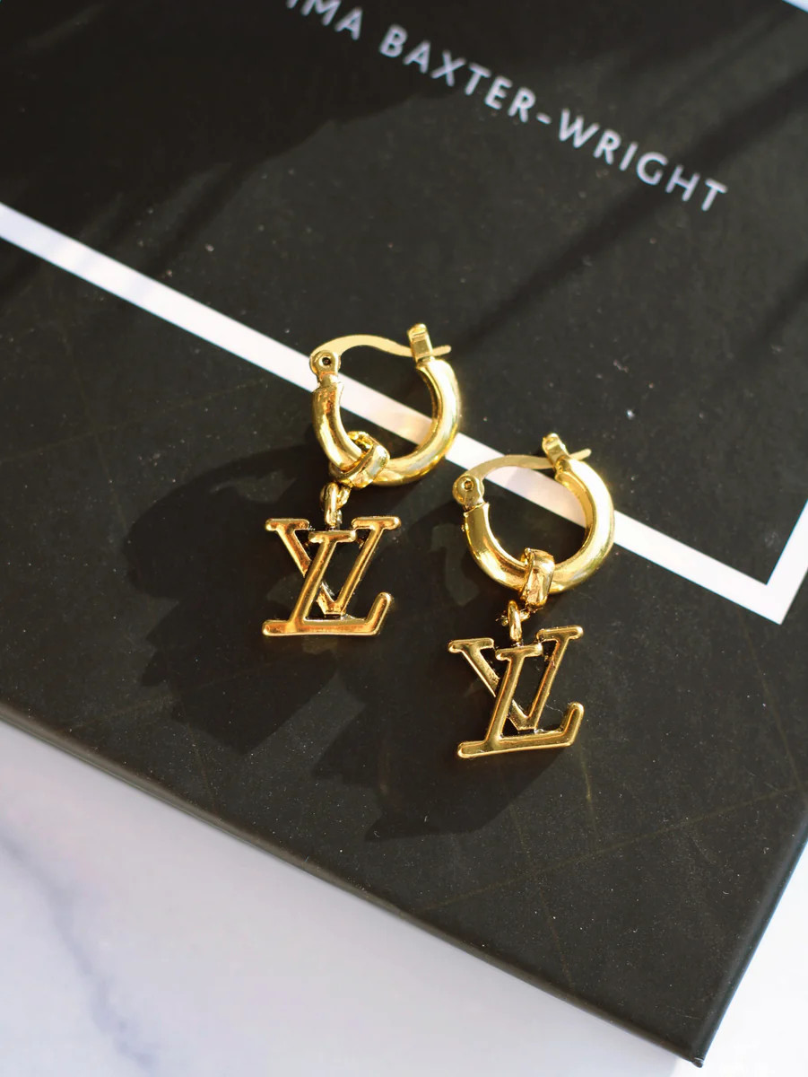 CELLO DANGLE EARRINGS IN GOLD | raëliv