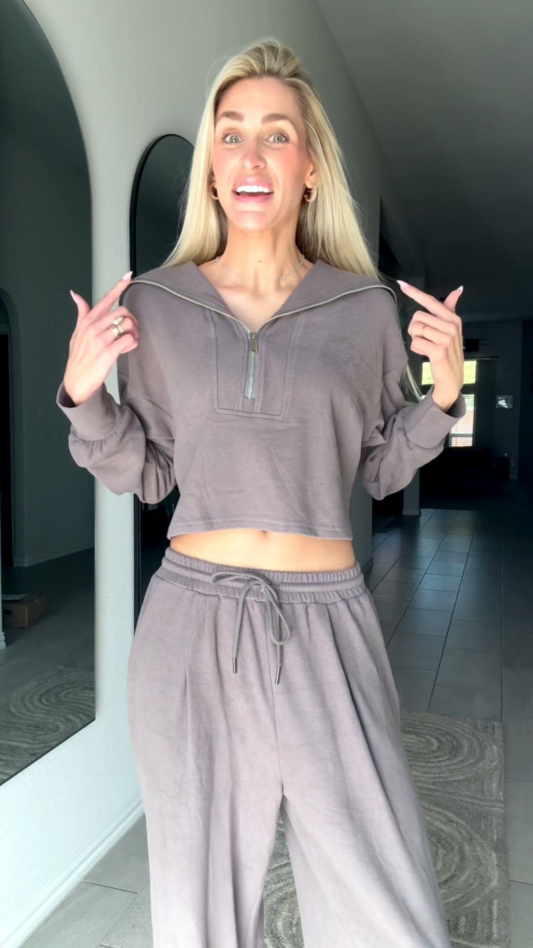 This charcoal lounge set is the definition of cozy chic! I love the half-zip cropped sweatshirt with the wide collar—it gives that effortless, relaxed vibe. The wide-leg pants are soft, flowy, and have a drawstring waist that actually flatters your shape. Perfect for lounging at home or running errands in style—super comfy but still put-together.

#LTKSeasonal #LTKTall #LTKStyleTip