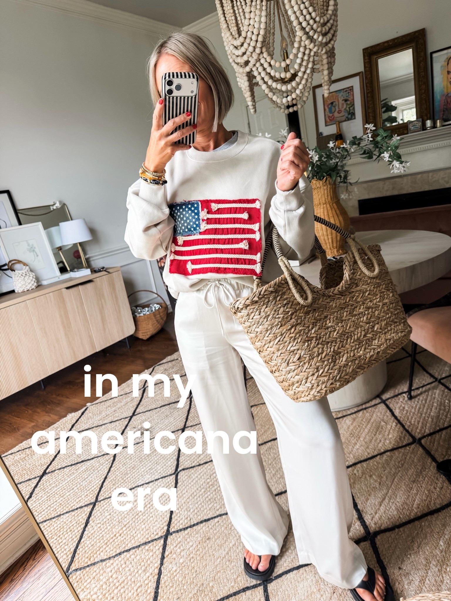 this sweatshirts is so cute i couldn’t resist!  At $30 it came home with me in my true size small

satin lodge pants or you could do a linen option
straw tote
elevated flip flops- a big trend for Summer outfits 2026

#LTKmomlife #LTKOver40 #LTKSeasonal
