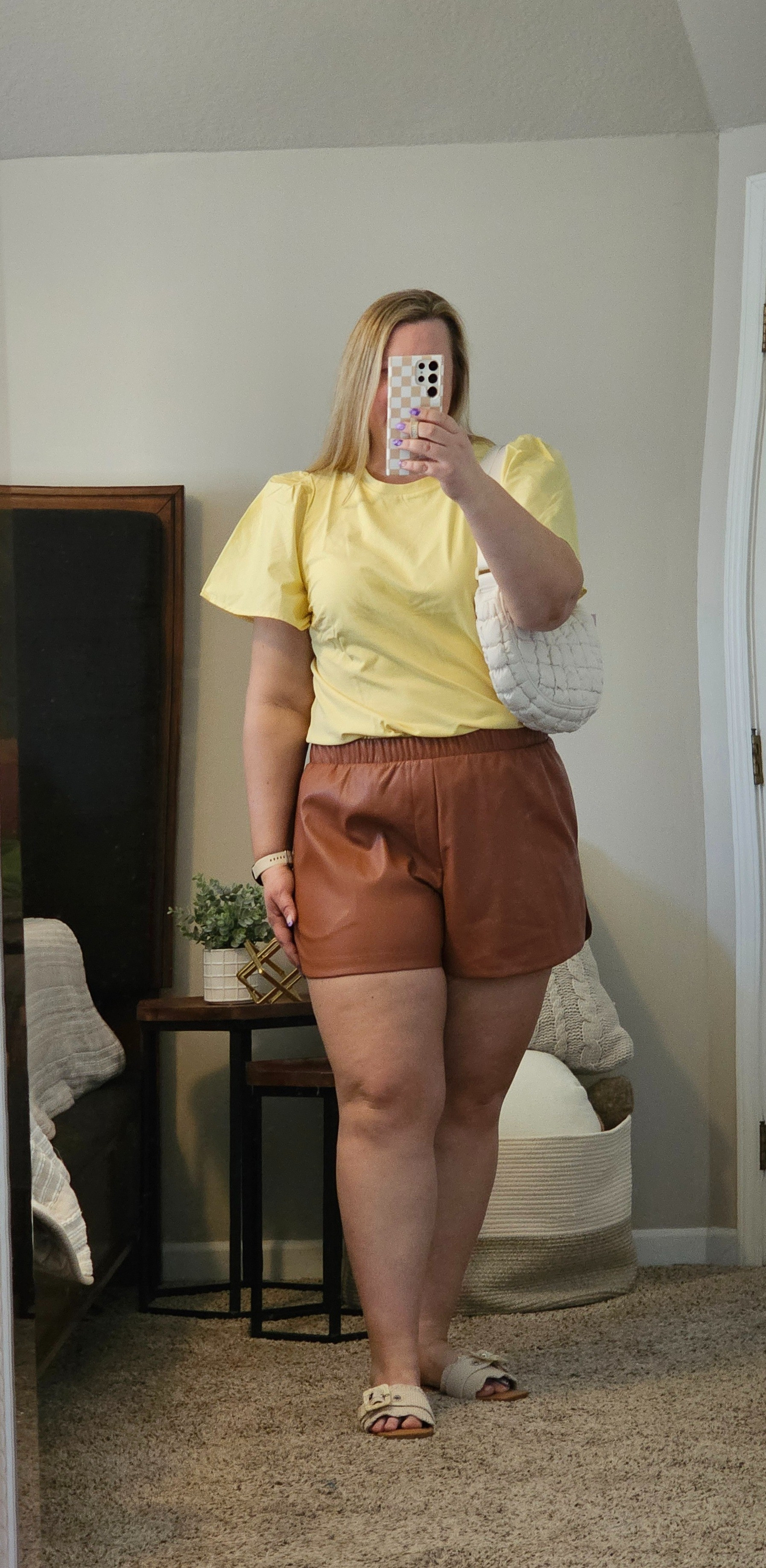 These faux leather shorts come in black and brown.  Wearing an XXL.  Different sleeve top is also an XXL and comes in multiple colors (I grabbed the yellow, pink, and bright green).

#LTKover40 #LTKmidsize #LTKfindsunder50
