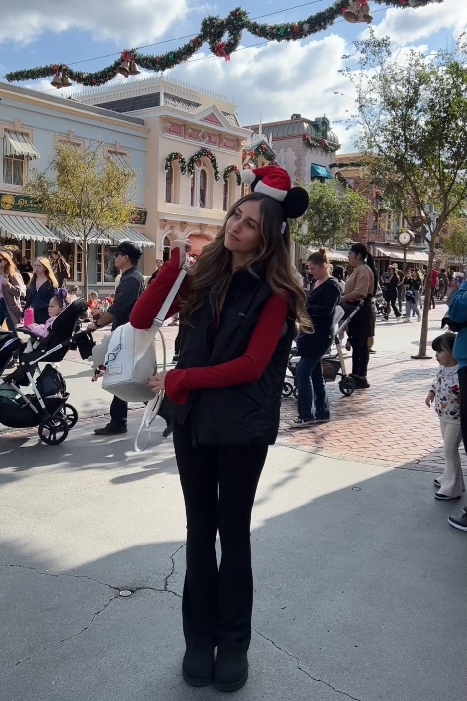 Another fitmas ♥️

Ears: Disneyland/Shop Disney
Red long sleeve: Garage clothing
Vest: Nat Geo collection from Disneyland/Shop Disney
Bag: Loungefly
Flare leggings: Aerie
Shoes: Uggs

Ig: @jkyinthesky & @jillianybarra

#disneystyle #fitmas #styleinspo 

#LTKstyletip #LTKfindsunder100 #LTKSeasonal