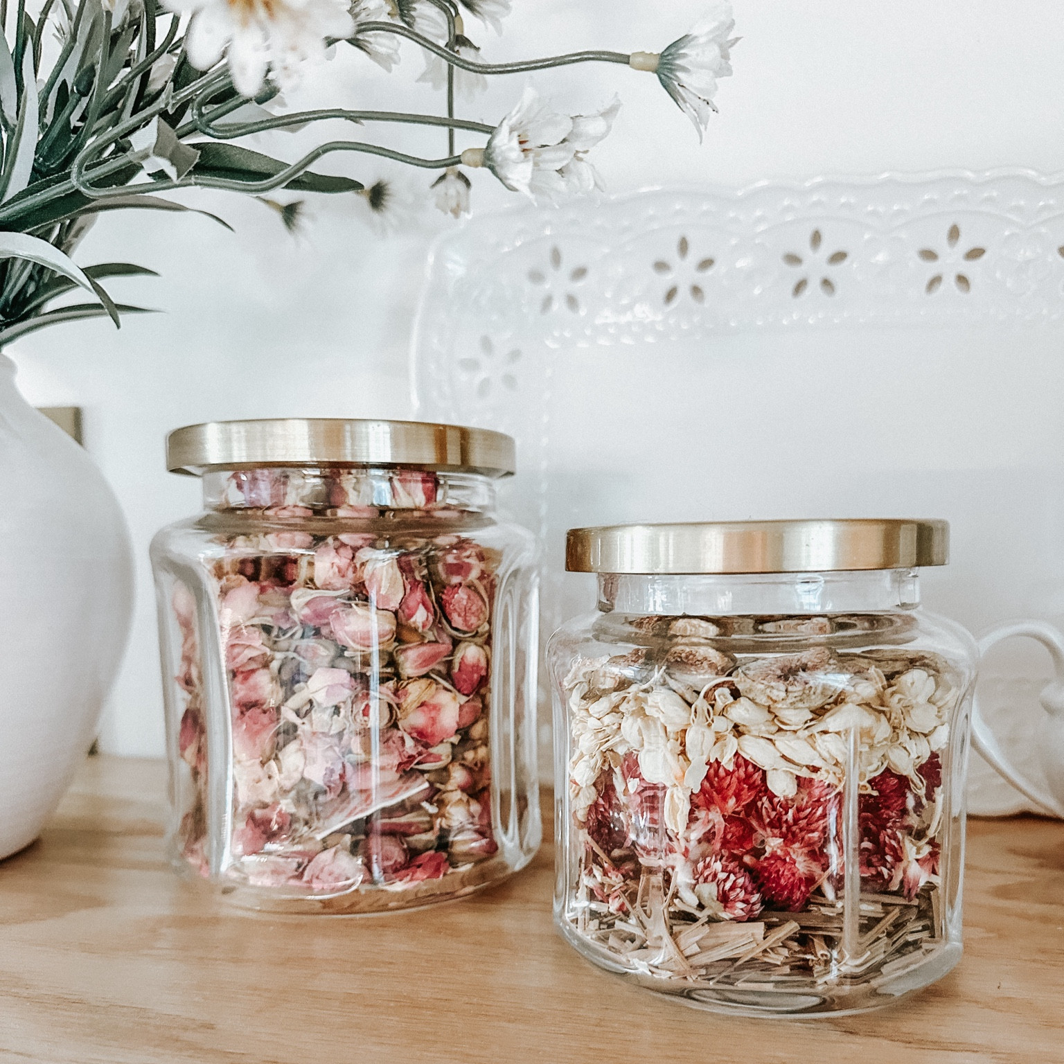 I love using dried flowers as decor! Put some in a jar to bring in some spring color! With the ones I linked, you can make it your own by choosing which dried flowers you use, with colors that complement any decor or style! While my jars are old Hearth & Hand, I linked some I would use instead! (I’ve been eyeing the ones with the wooden tops for a while now!) Happy Spring! 🌷🩷

#LTKhome #LTKSeasonal