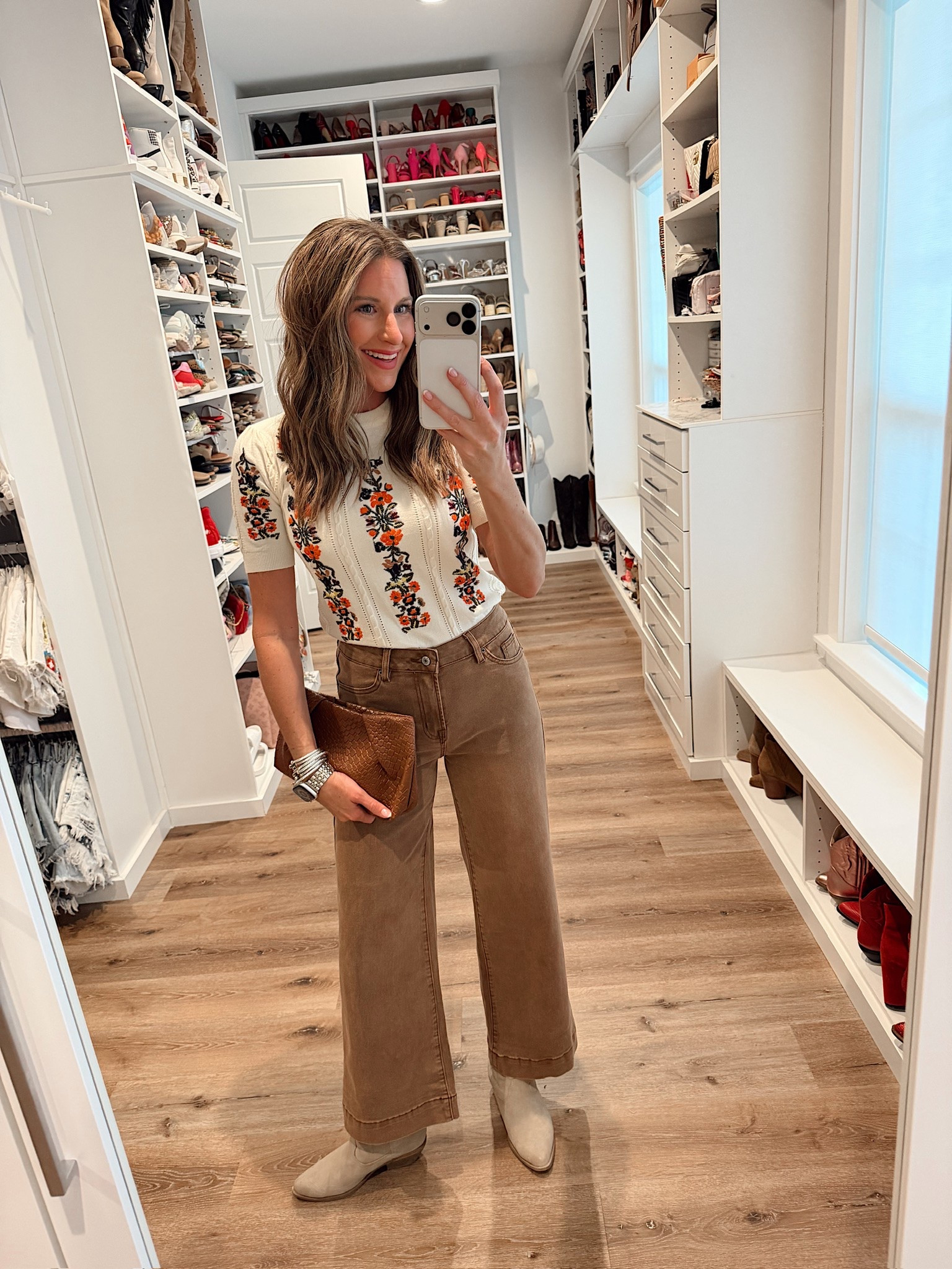 In a small top, size 4 jeans, boots, clutch and accessories - fits tts.

#LTKootd #LTKgrwm #LTKSeasonal