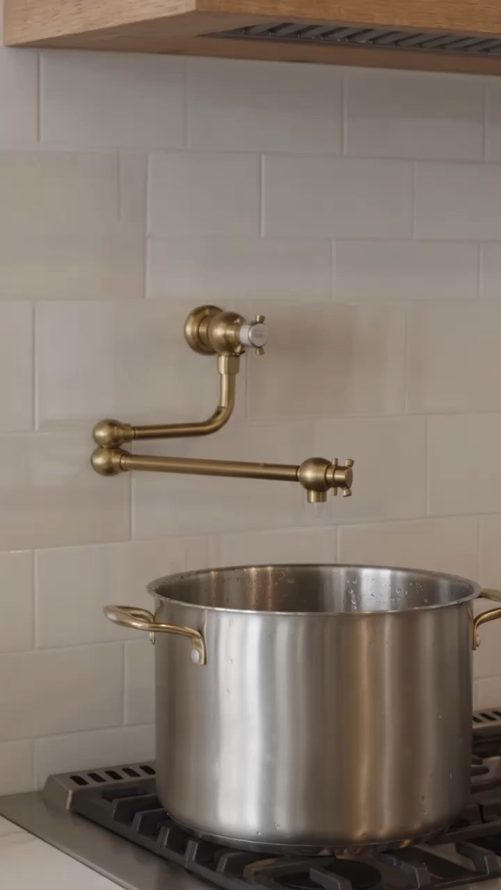 A pot filler is one of those kitchen details that feels both beautiful and incredibly functional ✨

No more carrying heavy pots full of water from the sink across the kitchen — especially when cooking pasta, soups, or larger meals. I also love how it instantly gives the kitchen that custom luxury feel, especially paired with warm brass finishes and a beautiful range setup.

It’s one of those features that makes everyday cooking feel a little more elevated 🤍

#potfiller #kitcheninspo #luxurykitchen #brassfixtures #kitchendesign #customkitchen #kitchenhardware #whitekitchen #modernkitchen #kitchendetails #homeinspo #interiorinspo #kitchenremodel #cookingspace #designerkitchen #kitchenstyling #functionaldesign #brasskitchen #statementfixtures

#LTKHome #LTKMothersDay #LTKHome