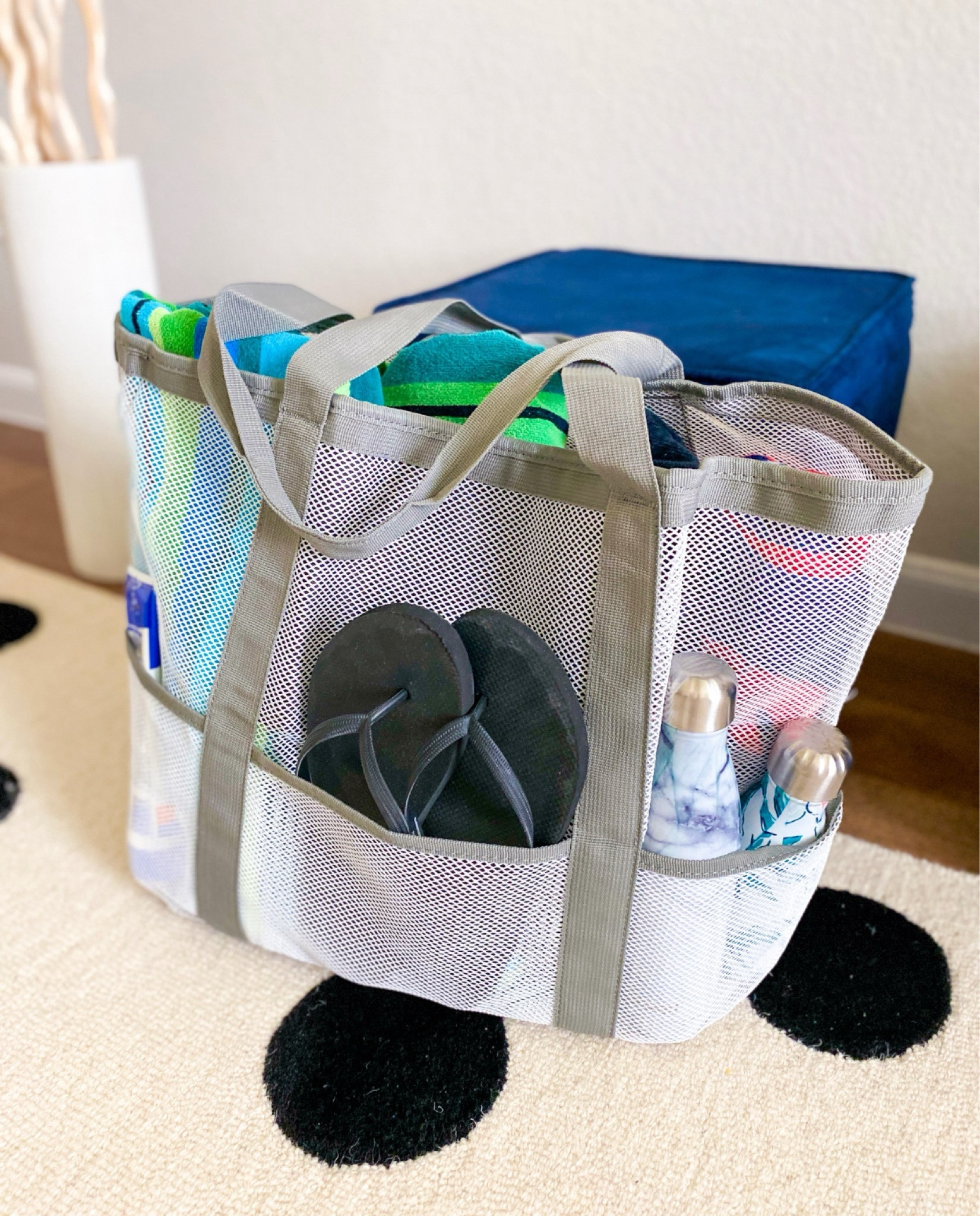 Multi pocket beach bag - we fit four large towels plus other items in the bag - extra clothes etc, and lots of pockets around the outside for easy access to things ; protected pocket on the inside 

Perfect for the beach or pool 

#LTKSaleAlert #LTKSummerSales #LTKItBag