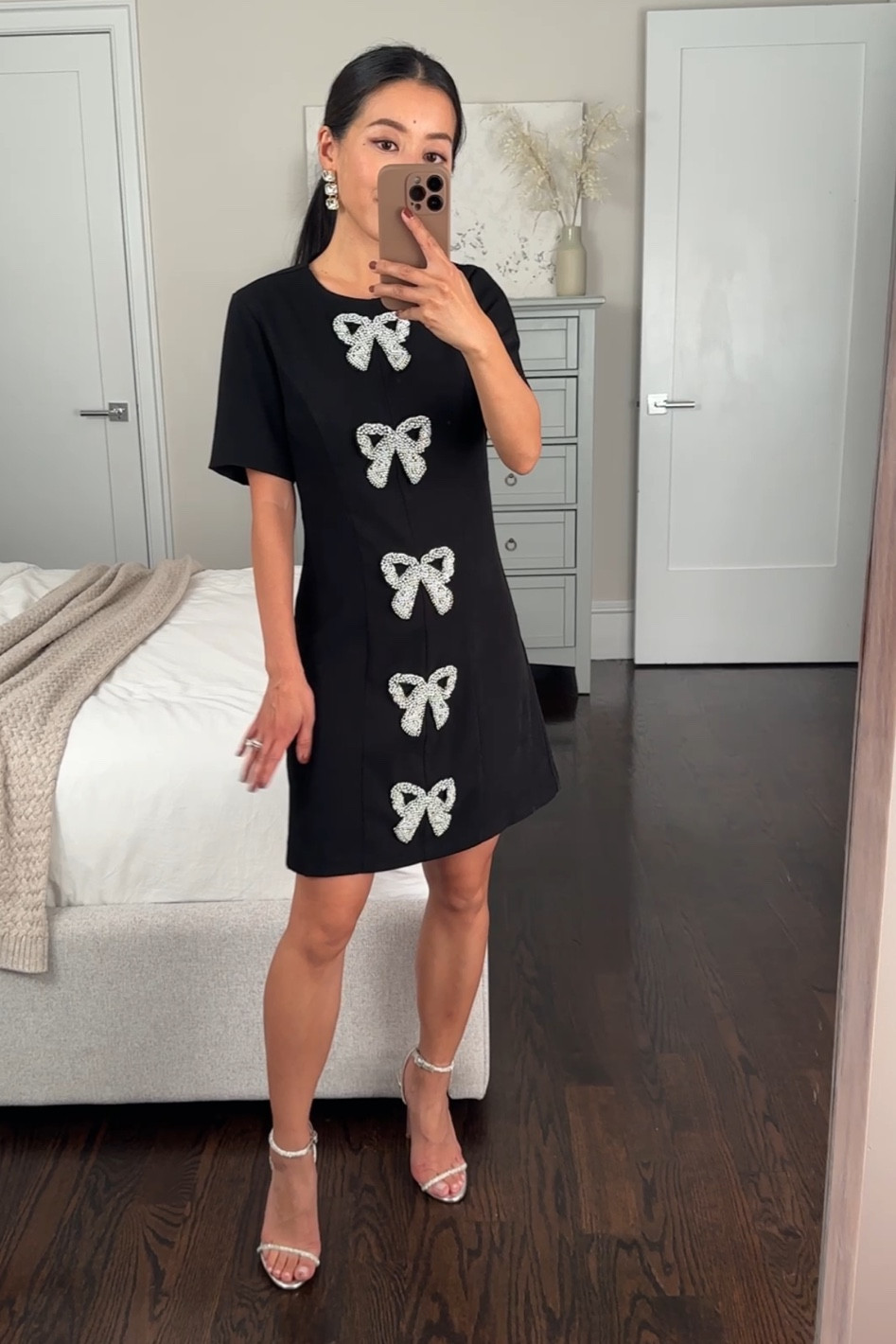 Will be sharing a few holiday try ons from @tuckernuck! #tuckernuckpartner 

Jeweled bow dress size xxs - This size is petite friendly and is gently fitted on me. In a stretch double weave fabric that’s fully lined, with rhinestone and pearl beaded bows down the front and a zipper 

When lying flat and not stretched. Size xxs Waist is 13.5” across, chest is 14.5” across, length is 33” 

I agree with the reviewer that this is a cute shift style that can be dressed down with sheer tights and flats too during daytime events, and with heels for parties. 

Shoes are old from simmi London

Petite friendly Christmas dress, family photos outfit ideas 

#LTKParties #LTKSeasonal #LTKHoliday