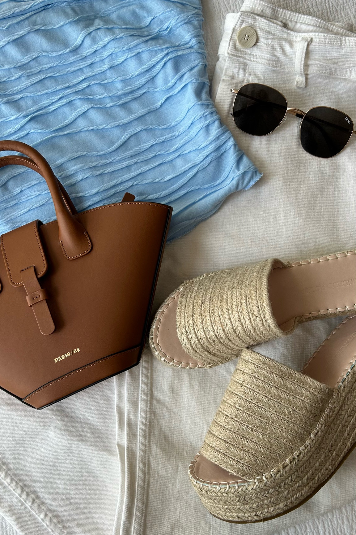Day time outfit wandering the streets of Florence! Purse is by Paris/64. Original jeans are sailor pants by Zara

#LTKtravel #LTKeurope #LTKstyletip