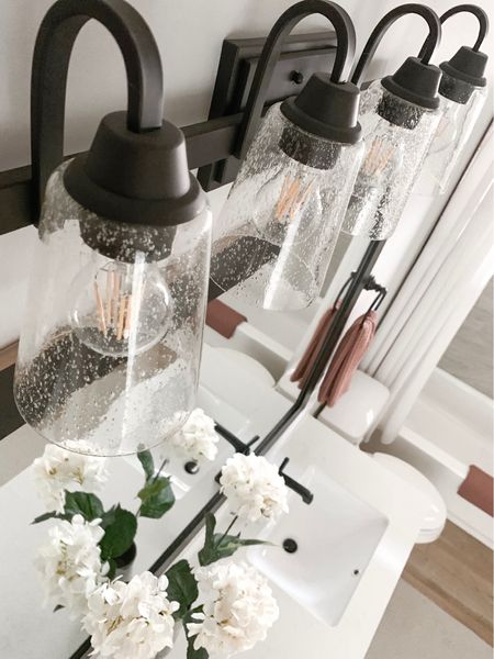 Linkin the same and similar light fixture we have in our guest bathroom. (Visit my IG profile, if you’d like to see an easy way to get those clean)

Home decor, bathroom decor, vanity light, bath towels, hand towels, faux greenery, vase

#LTKhome