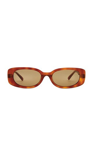 DEVON WINDSOR Milan Sunglasses in Rust. | Revolve Clothing (Global)