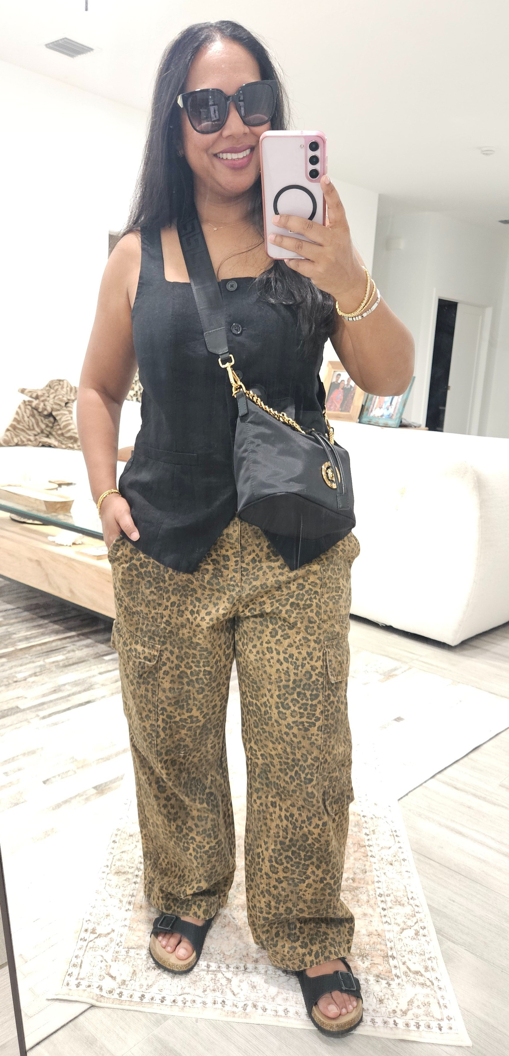 Vest and leopard cargo pants! Linked similar items and exact bucket bag! 

#LTKOver40 #LTKStyleTip