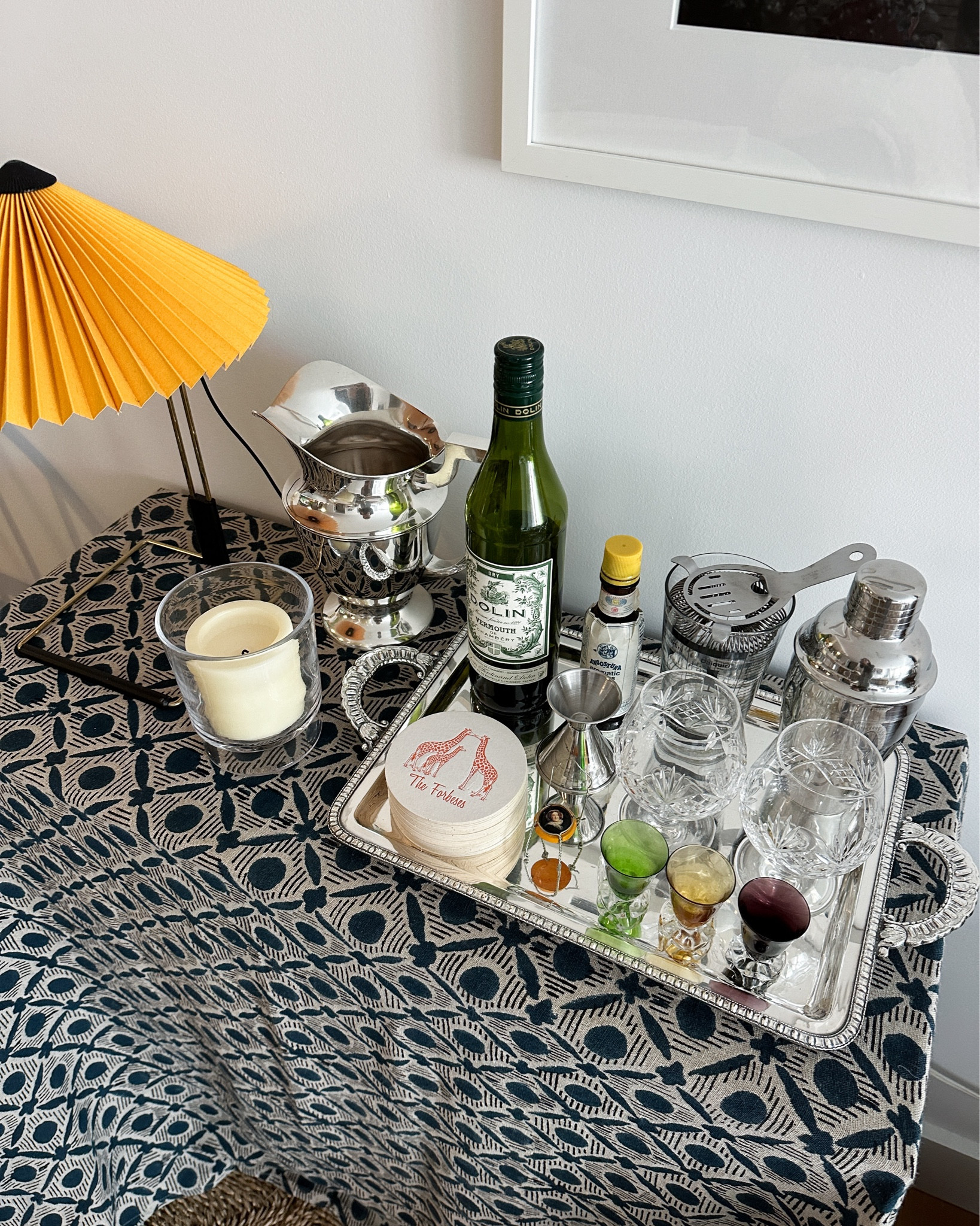 Everything I used to create my bar at home. Instead of a bar cart, I dressed up a cheap console table with a colorful patterned tablecloth. Then I styled it with beautiful accessories like vintage glassware, personalized coasters, and a lamp with a contrasting pop of color.



Bar styling, tabletop styling, holiday entertaining 

#LTKSeasonal #LTKHome
