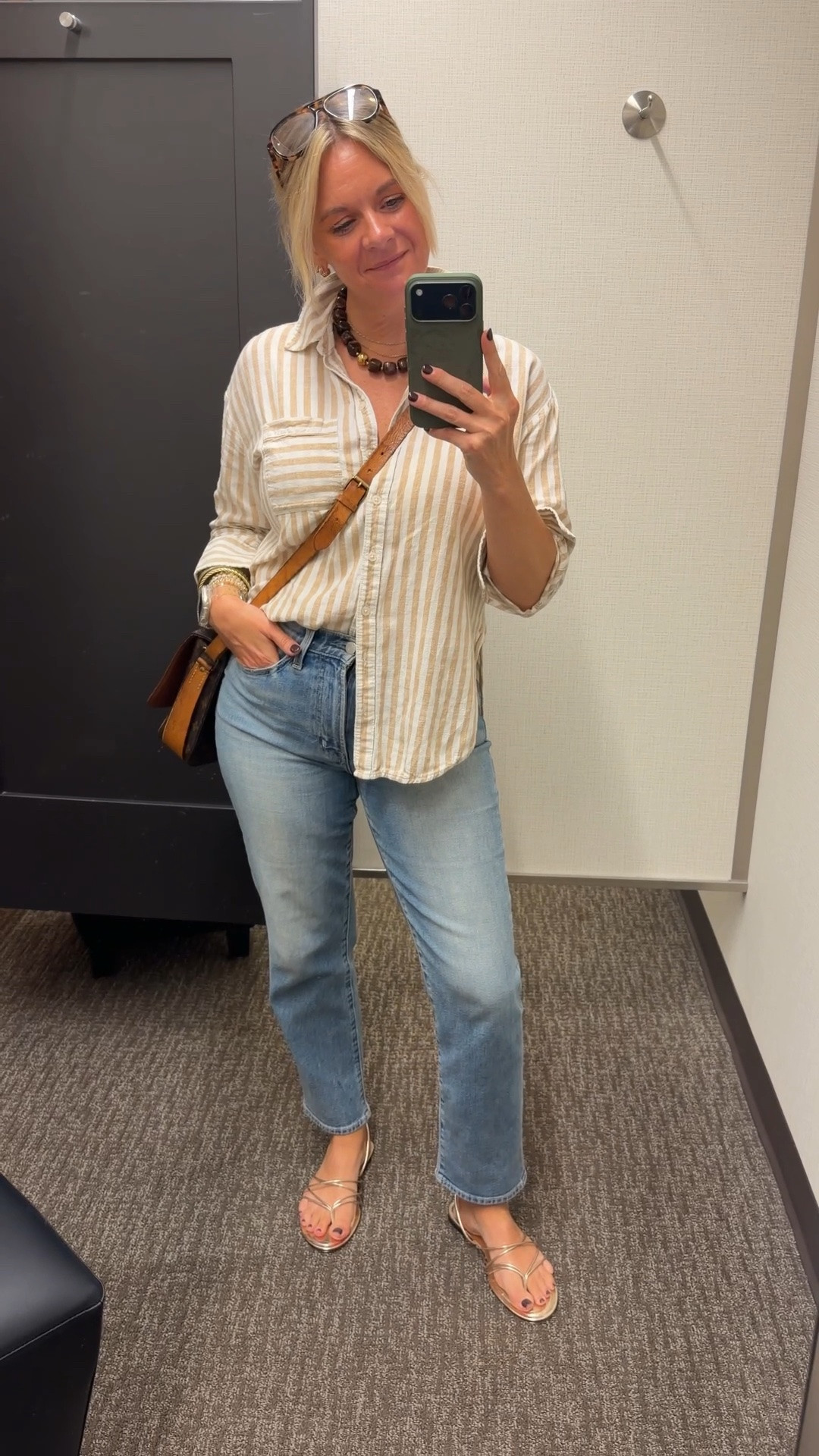 Here are 3 reasons a striped button down is the easiest shirt in your closet 👇

🤎 It’s more interesting than a plain white button down without trying harder. Stripes add just enough visual interest to feel intentional, but they’re still neutral enough to pair with absolutely everything.

🤎 It works buttoned up or thrown over anything. Wear it fully buttoned with denim, half tucked with trousers, or open over a tank as a layer — one shirt, endless ways to wear it.

🤎 It elevates basics instantly. Light wash denim and a simple sandal is a great outfit on its own. Add a striped button down and suddenly the whole look feels considered and put together.

OOTD ✨ Striped linen button down + light wash straight leg denim + minimal gold sandals + a chunky necklace. All from my own closet — linked the closest versions I could find. Everything shoppable below! 👇

#LTKdayinmylife #LTKootd #LTKOver40