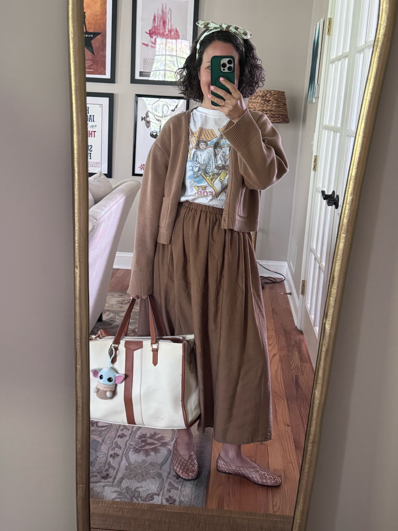 Star Wars day! Chilly this morning so I had a cardi on over my Star Wars t; Mango skirt, canvas laptop bag and jam jelly flats 🤎

#LTKdayinmylife #LTKOver40 #LTKSeasonal