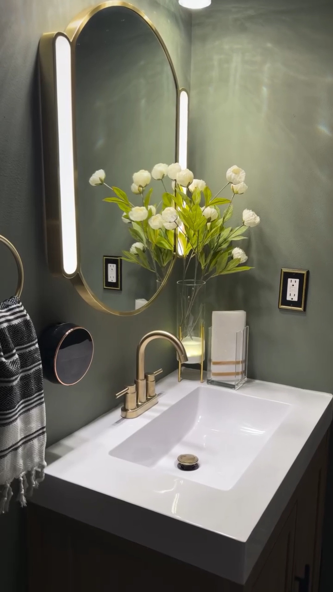 Small changes, big impact! #TheHomeDepotPartner

We refreshed our powder room using Glacier Bay products from The @homedepot and I’m loving the transformation!
I decided to color-drench the space and swap out the vanity. This Cargrove Bath Vanity is beautiful, modern and features a classic wood finish and fluted door panels that are reversible!The Oswell Bath Hardware Set and the Dorind faucet were the finishing touches this powder room needed! Shop Glacier Bay during The Home Depot’s Winter Bath Event and save up to 40% off select online bath items now through 3/27/26 

C0MMENT: Powder room and I will send you the 🔗

#ad #SmallProjectsBiglmpact #GlacierBay @shop.ltk #ltkit #liketk.it 

Bathroom ideas
Bathroom styling 
Bathroom Remodeling on a budget
home Inspiration 
Home decor

#LTKHome #LTKSaleAlert