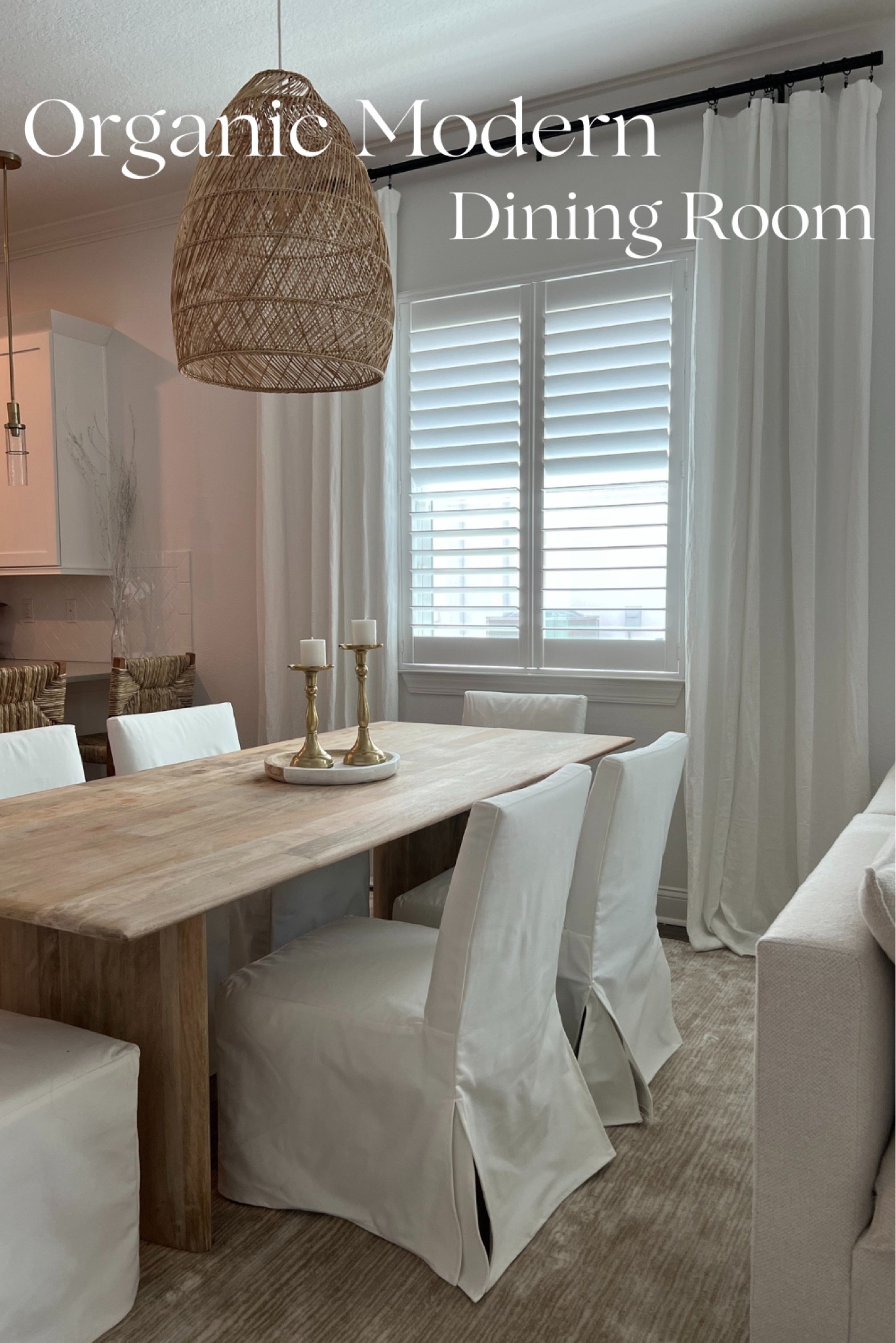 Beautiful Organic Modern Dining Room 

Pottery barn emery linen curtain Serena and Lily bell pendant Pottery Barn cast iron black curtain rod clip classic slipcovered dining chair West Elm solid wood table Amazon modern ombre living room bedroom area rug Crate and Barrel 4 piece reversible sectional sofa laurel glass 8 inch pendant brass 

#lookforless #organicdiningroom #organicmodern #salealert