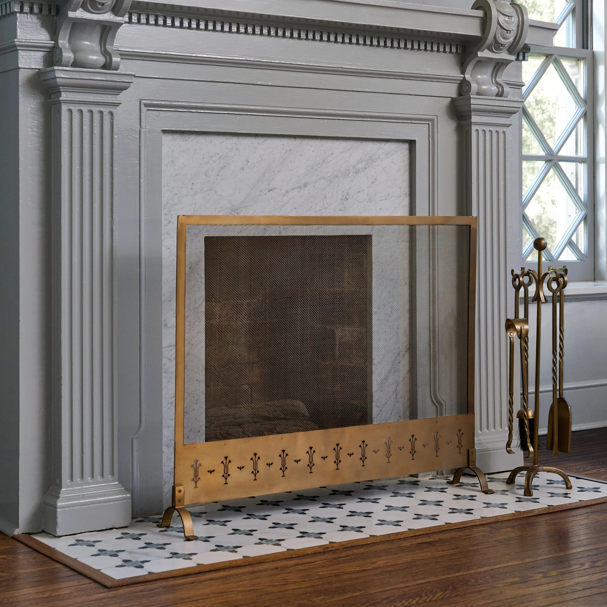 Antiqued Brass Tulip Carved Fireplace Screen | Magnolia