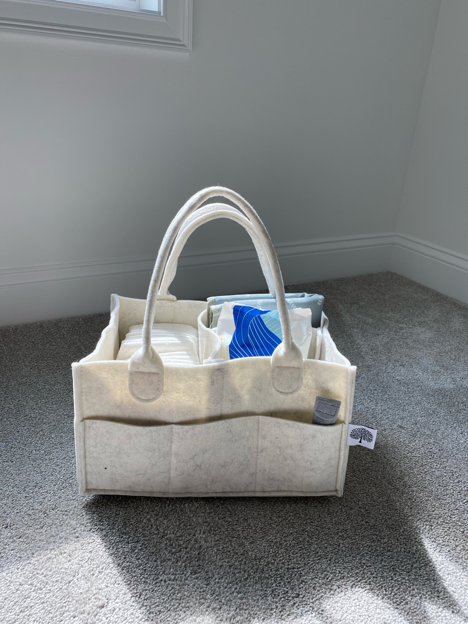 Obsessed with how cute this diaper caddy is, has so many reviews online and for good reason ✨

#firsttimemom #nesting #nurseryinspo 

#LTKBump #LTKFindsUnder50 #LTKBaby