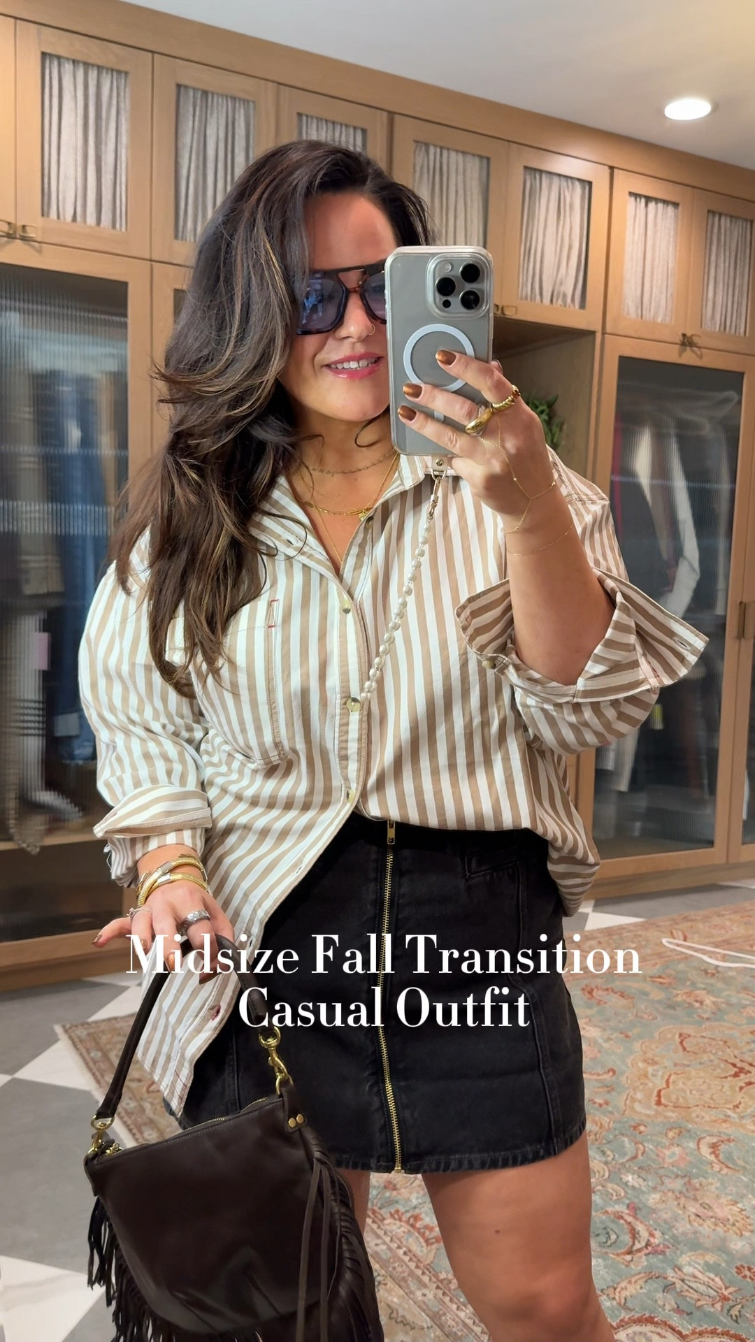 Midsize fall transition outfit idea 
Boyfriend button down runs big I’m wearing a large 
Denim skirt size 16 (I always size up one in denim skirts and shorts for a roomy fit on the tummy) 
Leopard sneakers are so comfy - cushion in the sole! Tts 
Chocolate brown Fringe bag is my new fall obsession 
Tinted glasses from Amazon 

#LTKFallSale #LTKVideo #LTKMidsize