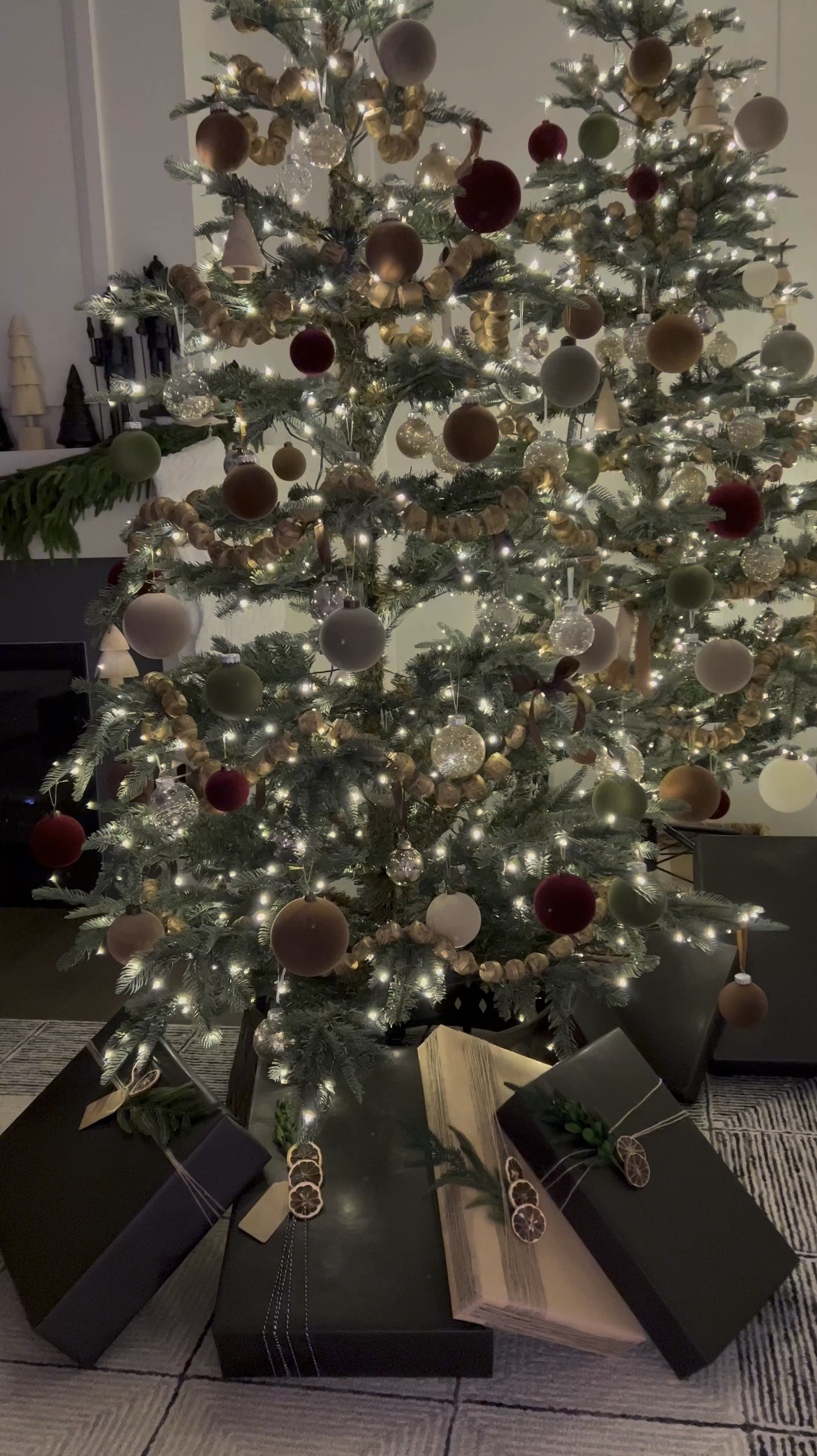 These gorgeous trees are from King of Christmas… The Christmas boxes are from Amazon 💕 I wrapped them with Kraft paper, twine, and added some dried oranges.  shop all these items below! 😊#LTKHoliday

#LTKHome #LTKStyleTip
