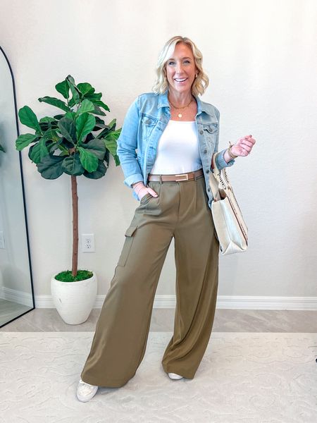 My ootd:
• White short sleeve bodysuit - size small (I recommend sizing down if in between sizes).
• Olive green cargo trousers - size 6. Elastic in the back of the waistband. Flowy with nice thickness. 
• Jean jacket - size small. $24.98.
• shoes linked (& tts), but also linking other option bc these are low in stock. 
• all other accessories linked as well. 
Casual work wear. Casual outfit  

#LTKstyletip #LTKsalealert #LTKfindsunder50