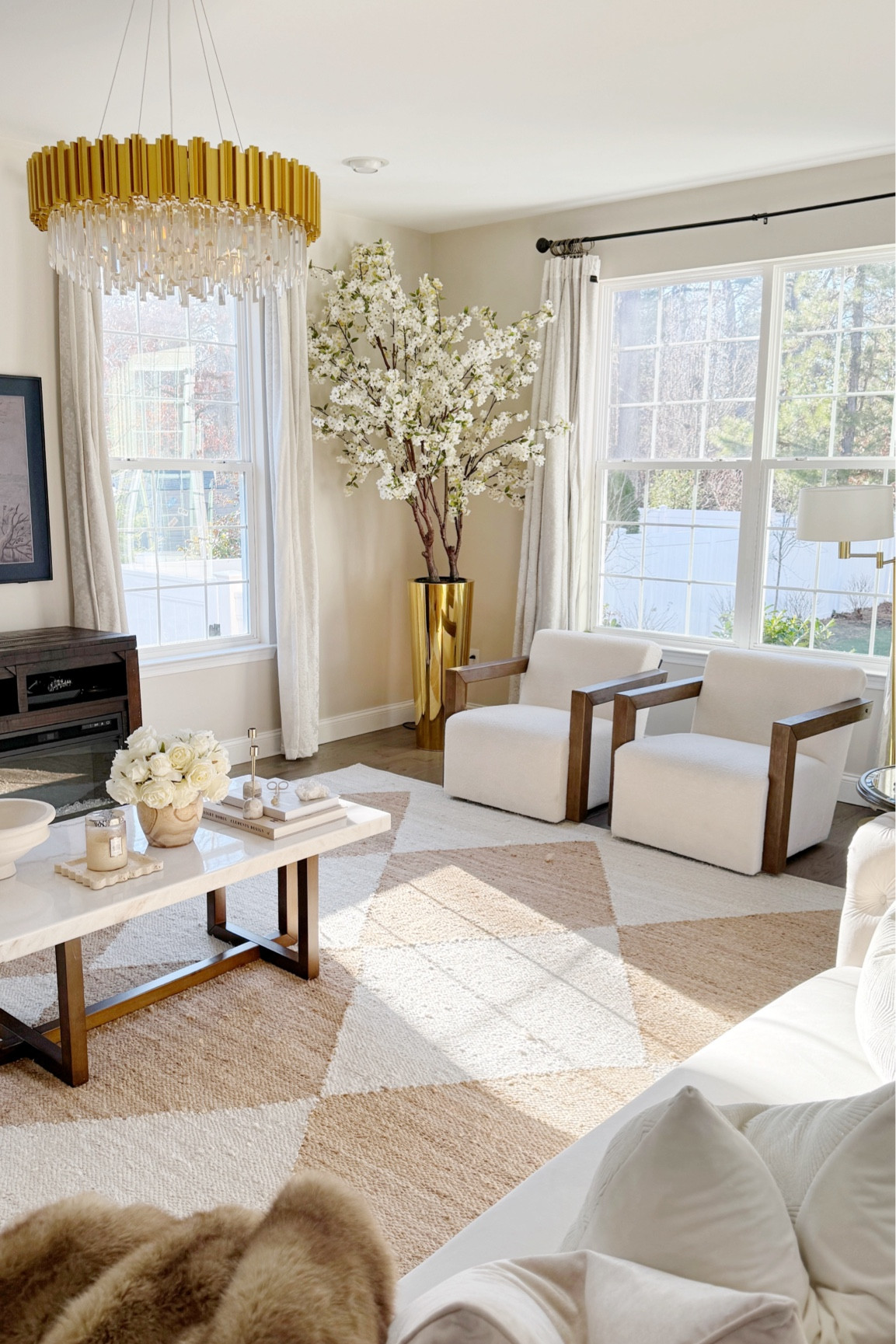 Neutral Winter Home Refresh

Living room
Checkered Rug
Accent chairs 
Boucle chairs
Boucle Accent chairs 
Marble coffee table
Coffee table books 
Brass chandelier 
Cherry blossoms
Valentines gifts 
Home decor 

#LTKhome #LTKSeasonal #LTKGiftGuide