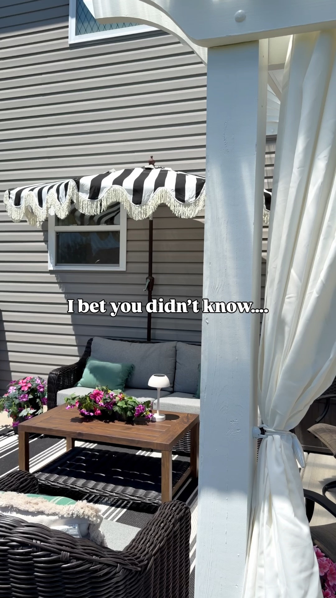 These half umbrellas can go right up against your house! Also linked the stand we used (it’s under the couch)!