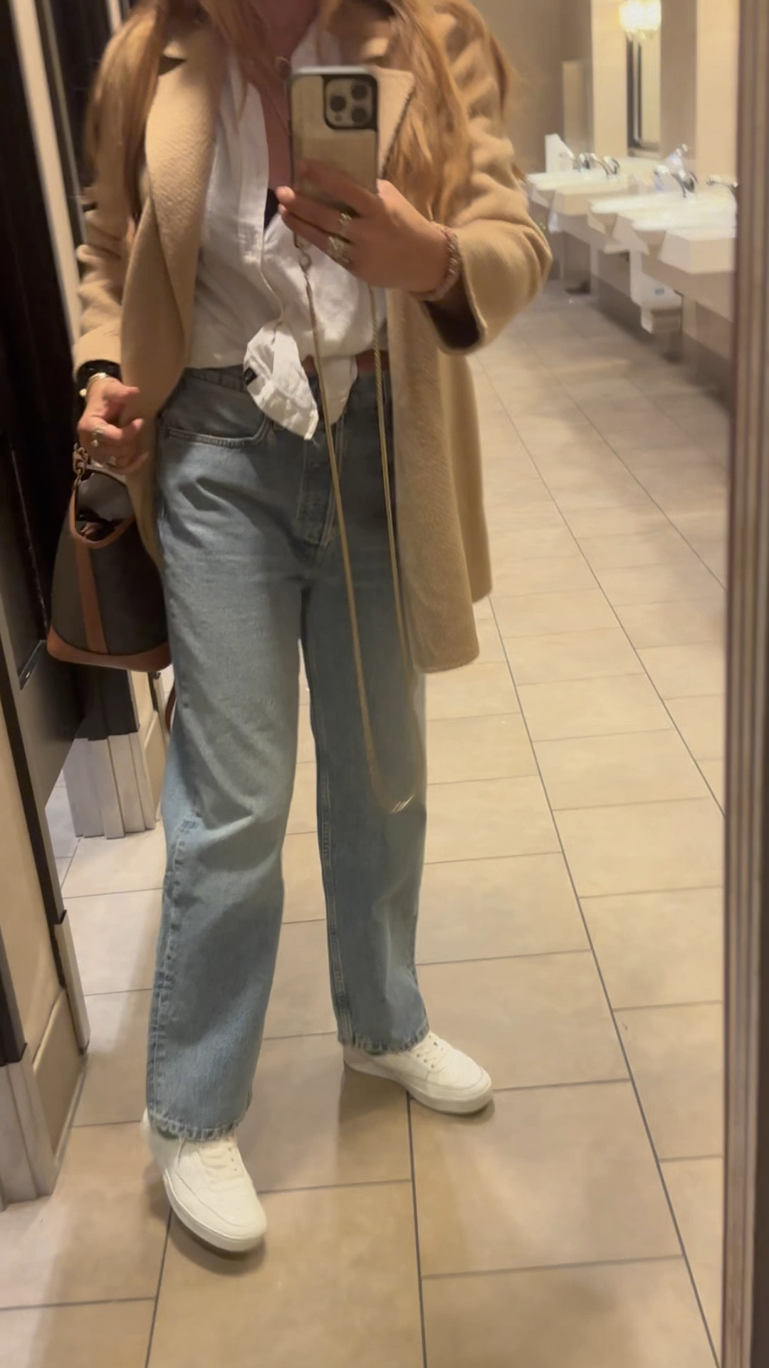 Minimalist style, camel blazer, white. Louse, 90s jeans, baggy jeans, high tops

Bought these jeans on sale and immediately changed into them as they were so much more comfortable than the jeans I was wearing that day. Sized up to a 28 for maximum roominess and I love the 90s feel 👖 

Blouse: men’s medium
Blazer: size medium (also on sale)
High tops: TTS
Use code BEAUTYPROFESSORT320 for 20% off my fav hot rollers 

#LTKFind #LTKSale #LTKbeauty