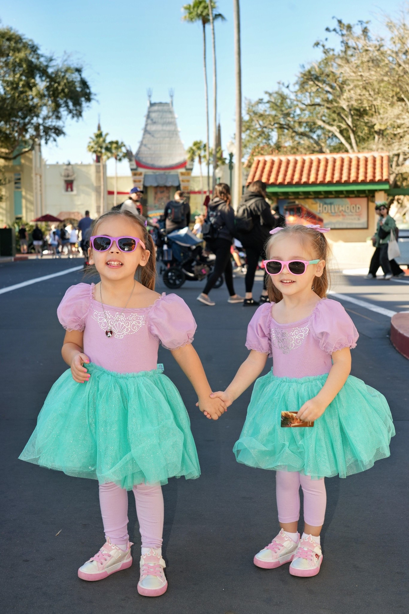If you’re doing Disney with toddlers, this outfit combo worked so well 🤍

I linked the girls’ dresses, leggings, and sneakers here for easy park days.