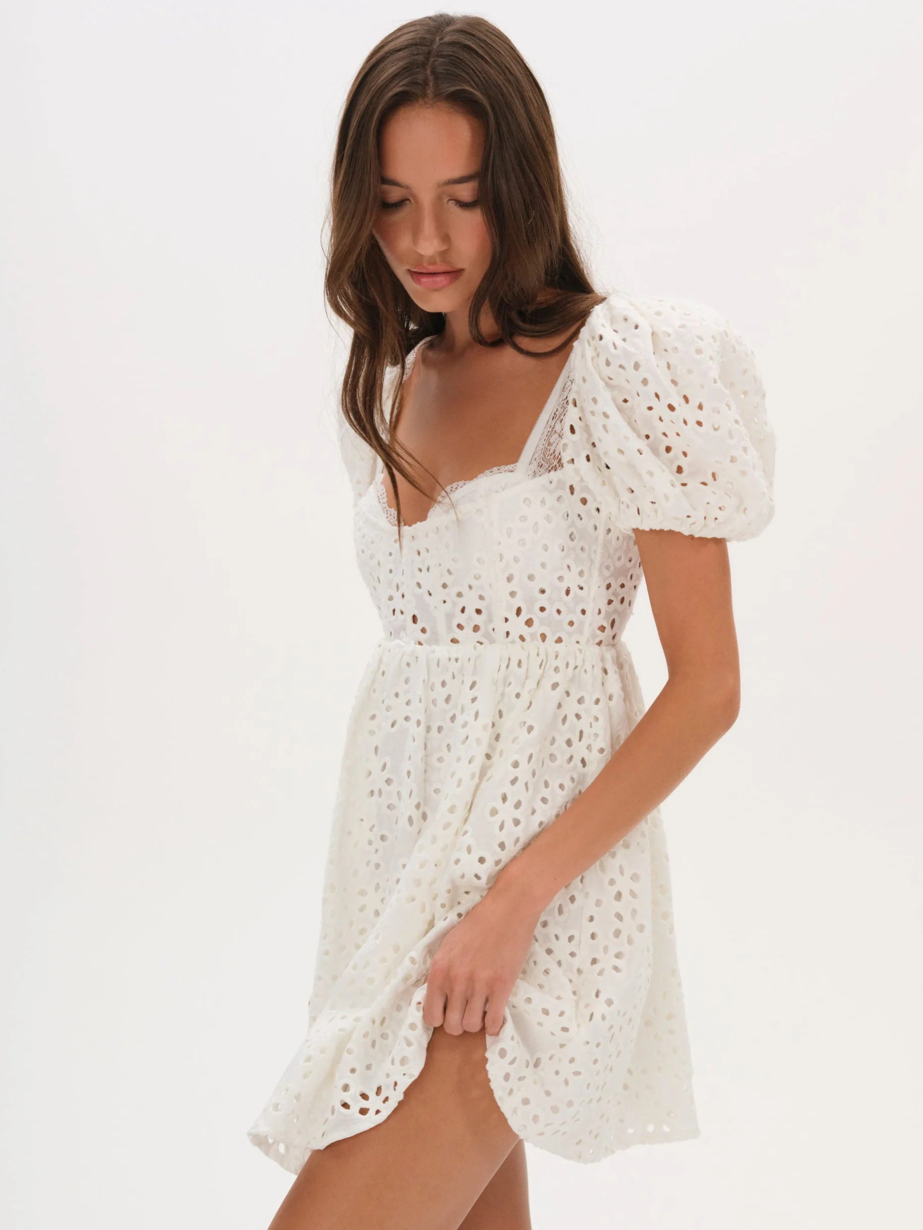 Becca Mini Dress$275 Select a sizeDreamy linen mini dress featuring eyelet embroidery and a corse... | For Love & Lemons