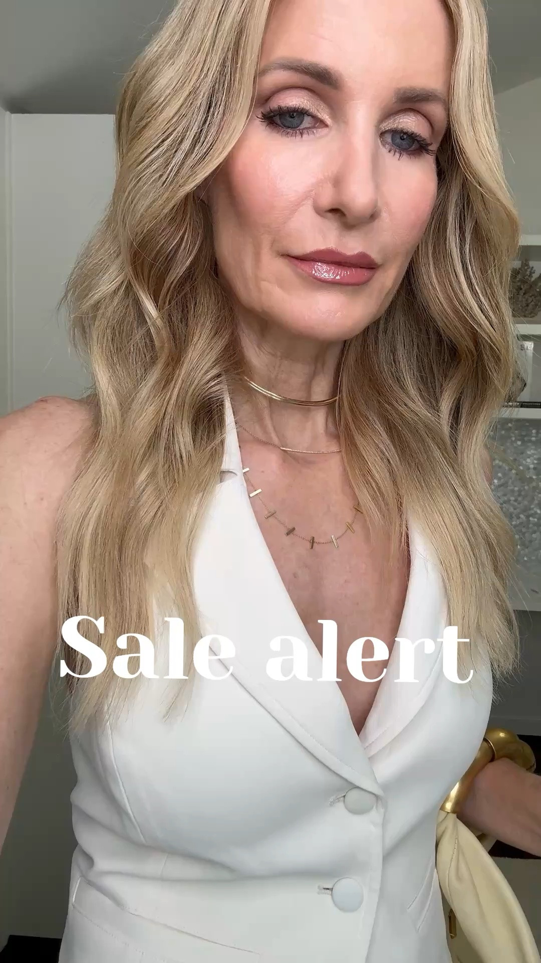 This halter vest is on major sale and is the perfect date night or girls’ night out top! I love the cinched waist and flattering halter back styled with these viral high-waisted jeans that lift your butt and make your legs look so long. I’m wearing an XS in the vest and size 24 in the jeans. #HalterVest #ViralJeans #DateNightOutfit #LTKOver40 

 #LTKootd #LTKSeasonal #LTKOver40