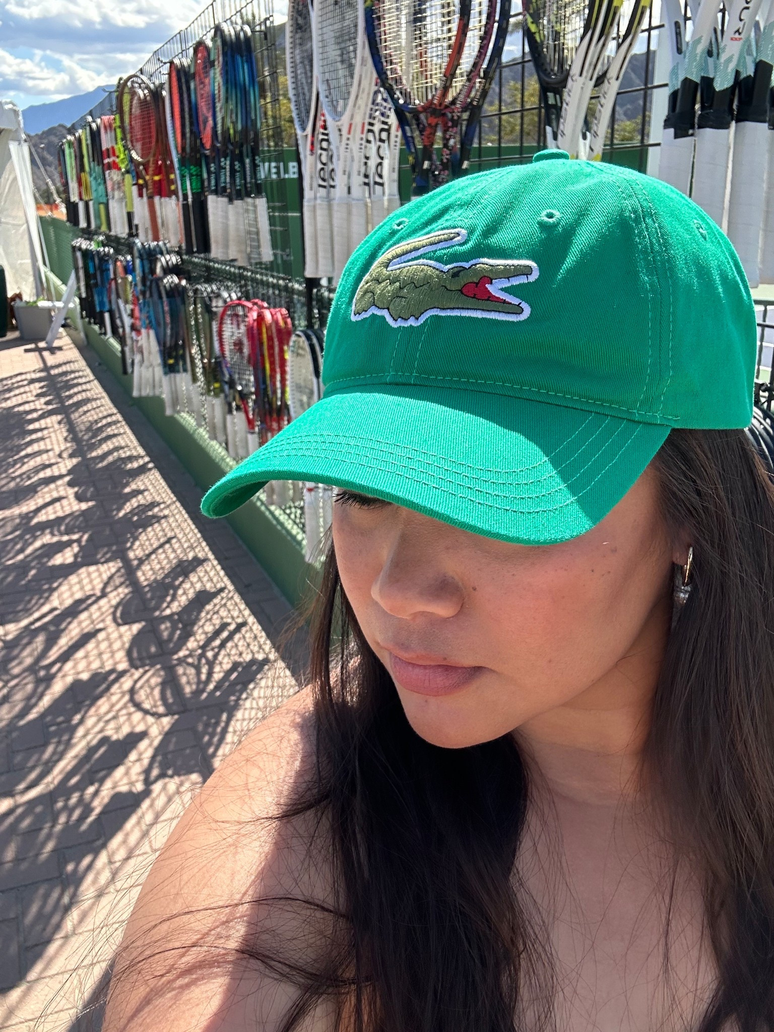 BNP Paribas Open Indian Wells Tennis Outfit Idea

What to wear to the BNP Paribas Open in Indian Wells. I love adding a pop of color to a tennis tournament outfit and this green Lacoste hat was the perfect statement piece for the day.

A colorful hat instantly elevates a simple tennis outfit and brings that sporty tennis aesthetic while still being practical. It also protects from the desert sun during long days watching matches. Style it with a classic tennis dress, sneakers, or an athleisure set for an easy spectator look that still feels polished.

Accessories like this are one of the easiest ways to make a tennis outfit feel intentional. Fun color, sporty energy, and sun protection all in one. Truly a win for a full day at Indian Wells.

#bnpparibasopen #indianwells #indianwellstennis #tennistournament #tennisoutfit #tennisoutfitideas #tennisfashion #tennisstyle #tennisspectatorstyle #tenniscore #athleisurestyle #sportychicstyle #desertstyle #tennisevent #lacoste

bnpparibas open outfit | indian wells tennis outfit | what to wear to indian wells tennis | tennis tournament outfit ideas | tennis spectator outfit | tennis fashion women | tenniscore outfit | athleisure tennis outfit | lacoste tennis hat | tennis hat outfit | desert tennis style | indian wells outfit ideas | tennis event outfit

#LTKootd #LTKMidsize #LTKActive