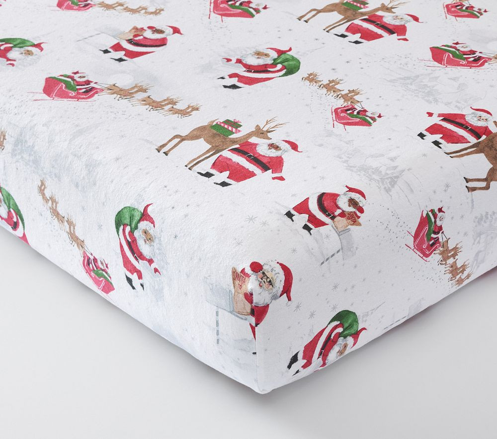 Organic Heritage Santa Flannel Crib Sheet , White Black Santa | Pottery Barn Kids