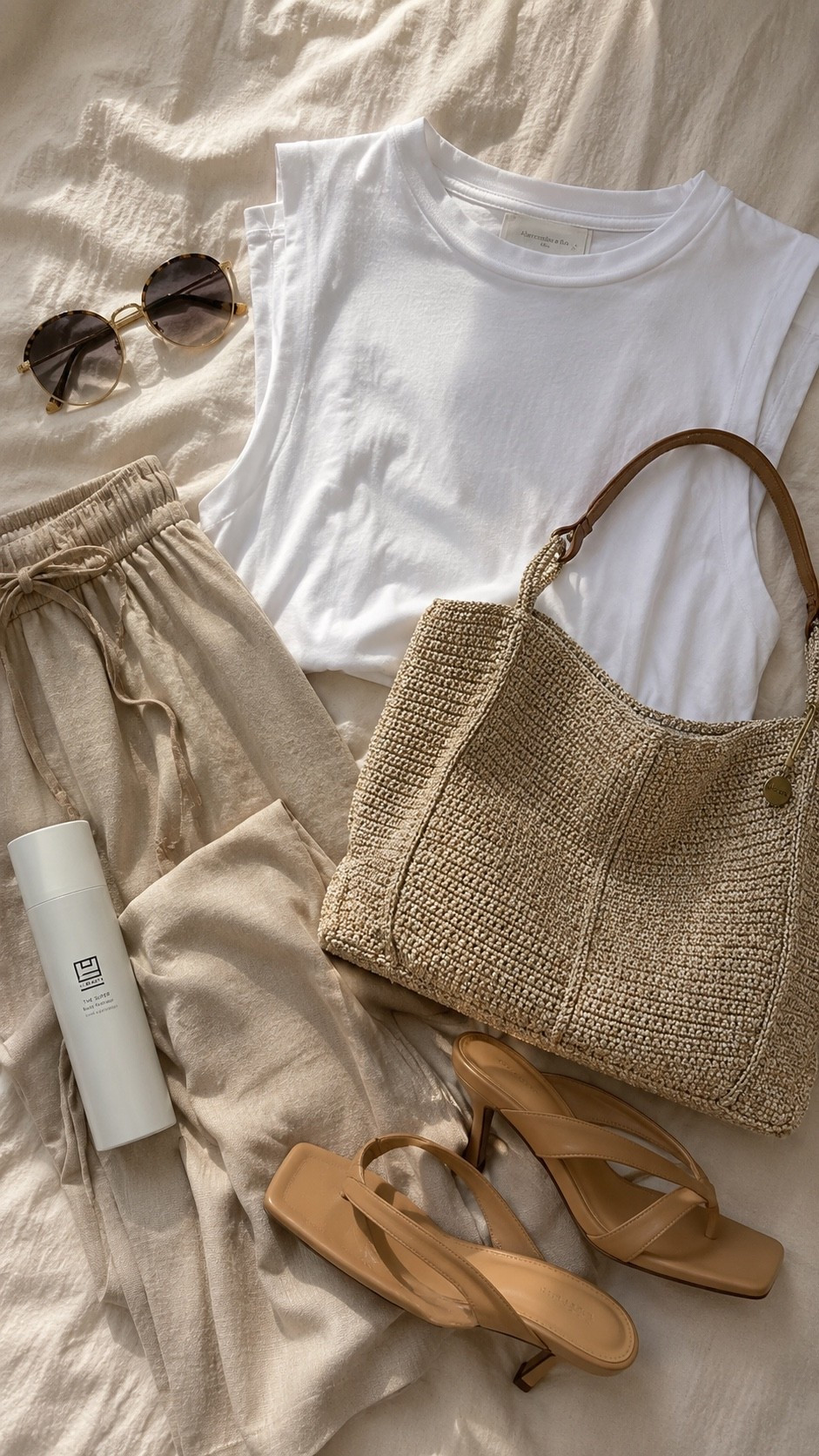 Whole look is Amazon! Neutral summer looks are my favorite lately 🤍  
Lightweight linen pants, the perfect white top, chic kitten heels, and this raffia tote that looks SO expensive. Finished it off with oversized sunnies and my favorite body hydrator for that glowy skin look ✨

summer outfit, spring outfit, neutral outfit, linen pants, white top, raffia tote, kitten heels, vacation outfit, chic outfit, elevated basics, resort wear, Amazon fashion

#LTKSeasonal #LTKgrwm #LTKootd