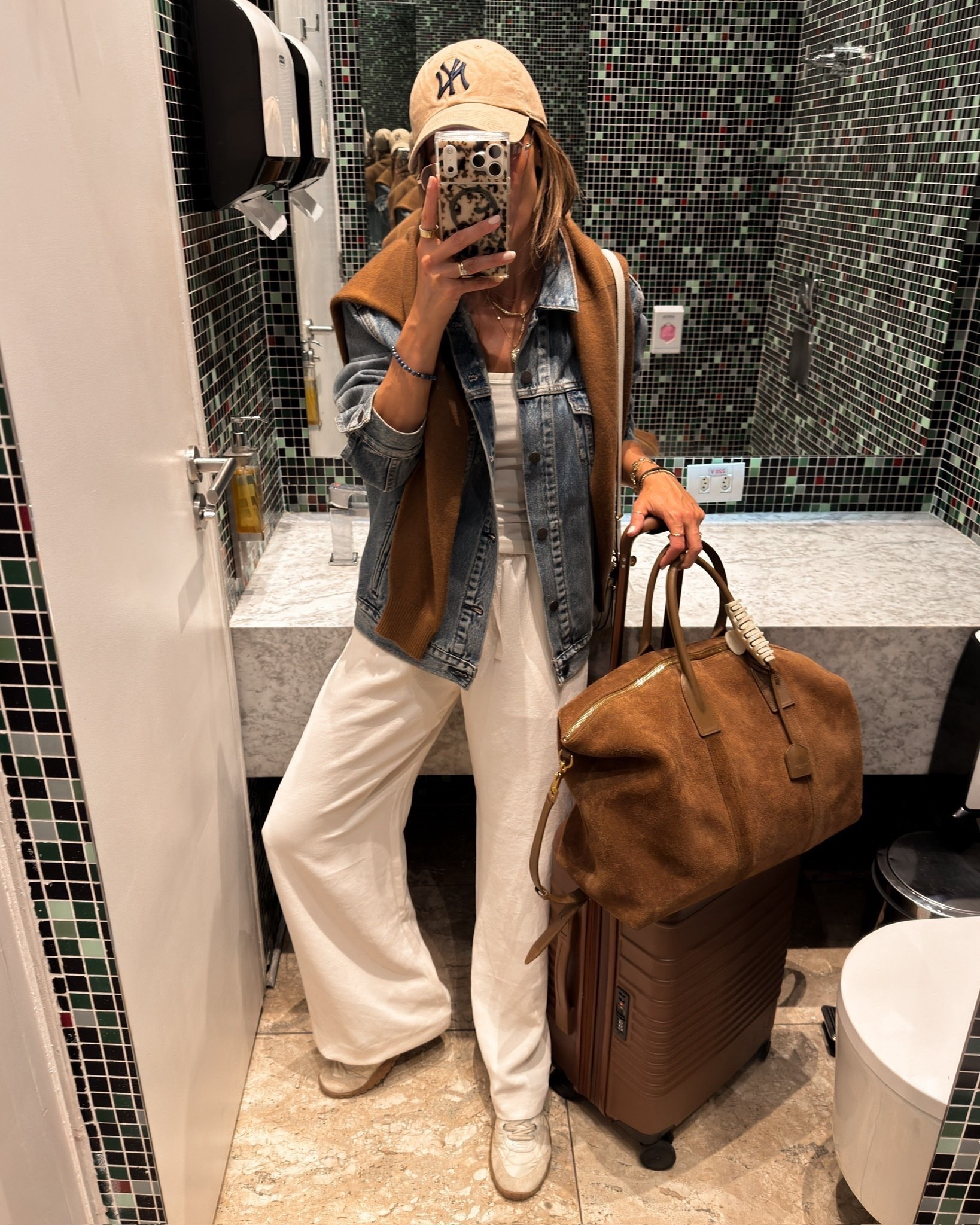 A perfect spring travel look, comfortable and elevated with layers you can add or remove throughout the day. Featuring my favorite pull up Aritzia pants — now on sale, and my new fav luggage

#LTKTravel #LTKootd #LTKdayinmylife